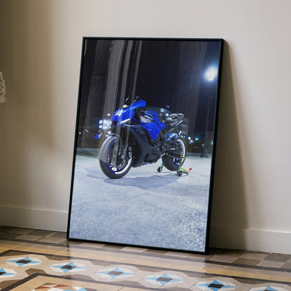 Yamaha R1 motorcycle poster with blue sportbike design displayed as modern wall art in black frame.