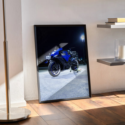 Yamaha R1 motorcycle poster in blue and black showcased as modern wall art in a sleek black frame.