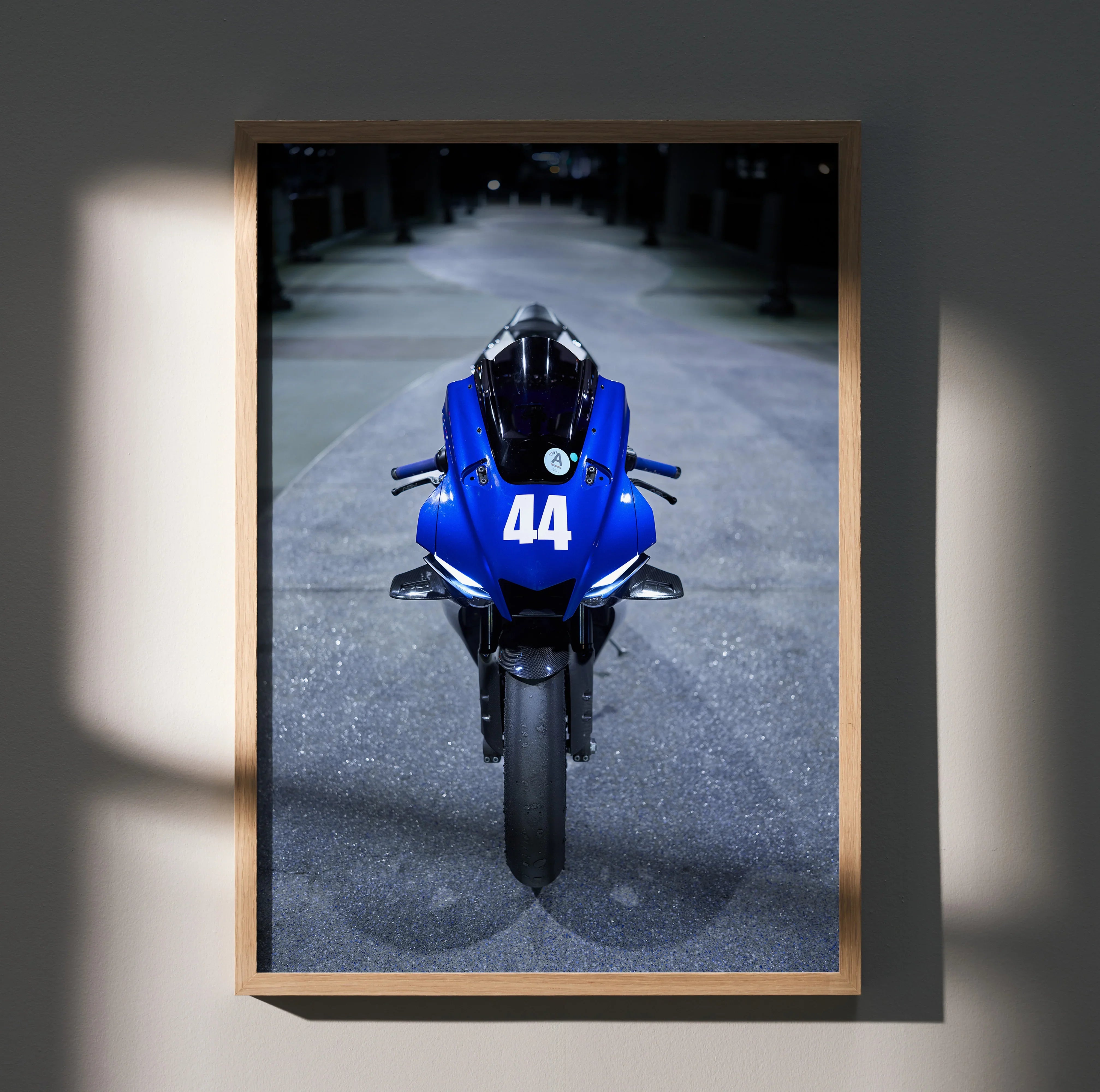 Blue Yamaha YZF-R1 motorcycle poster with racing number 44, sleek front view wall art.