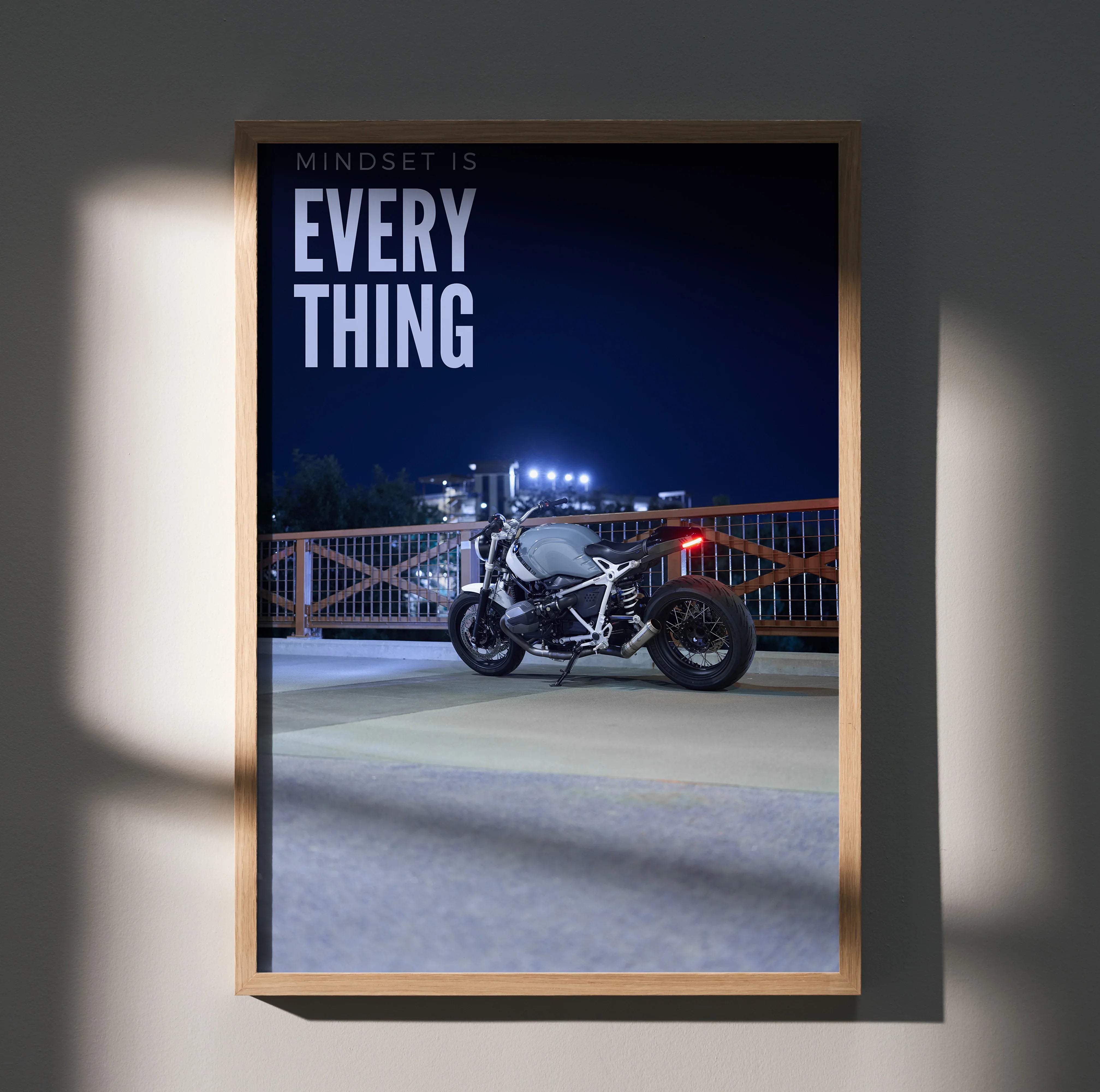 BMW R Nine T motorcycle parked at night with motivating text poster wall art.