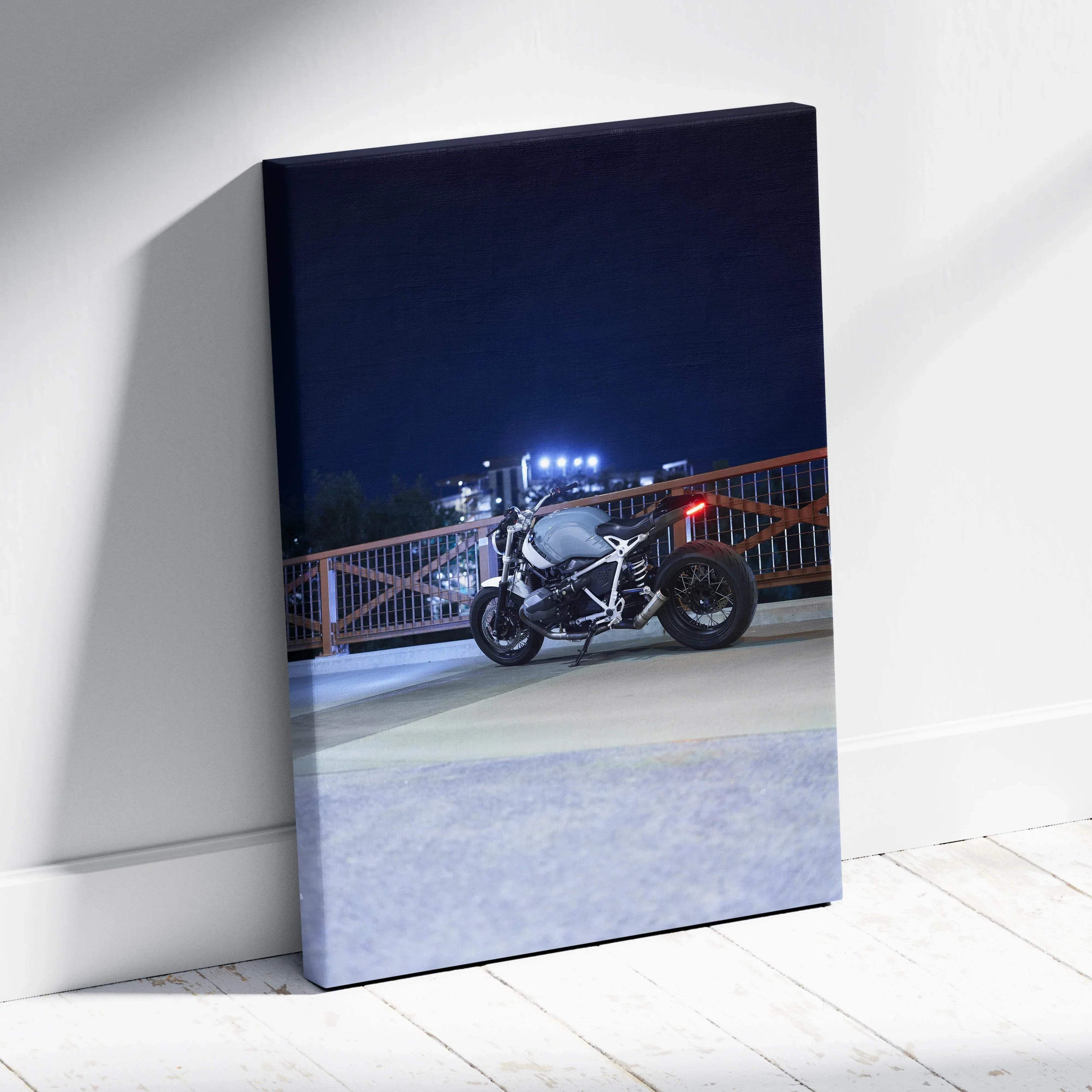 BMW R Nine T motorcycle canvas art with night cityscape, vertical wall art print.