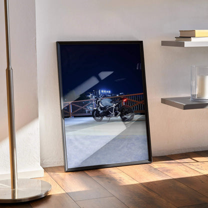 BMW R Nine T motorcycle night ride poster framed as premium wall art with dark blue sky background.