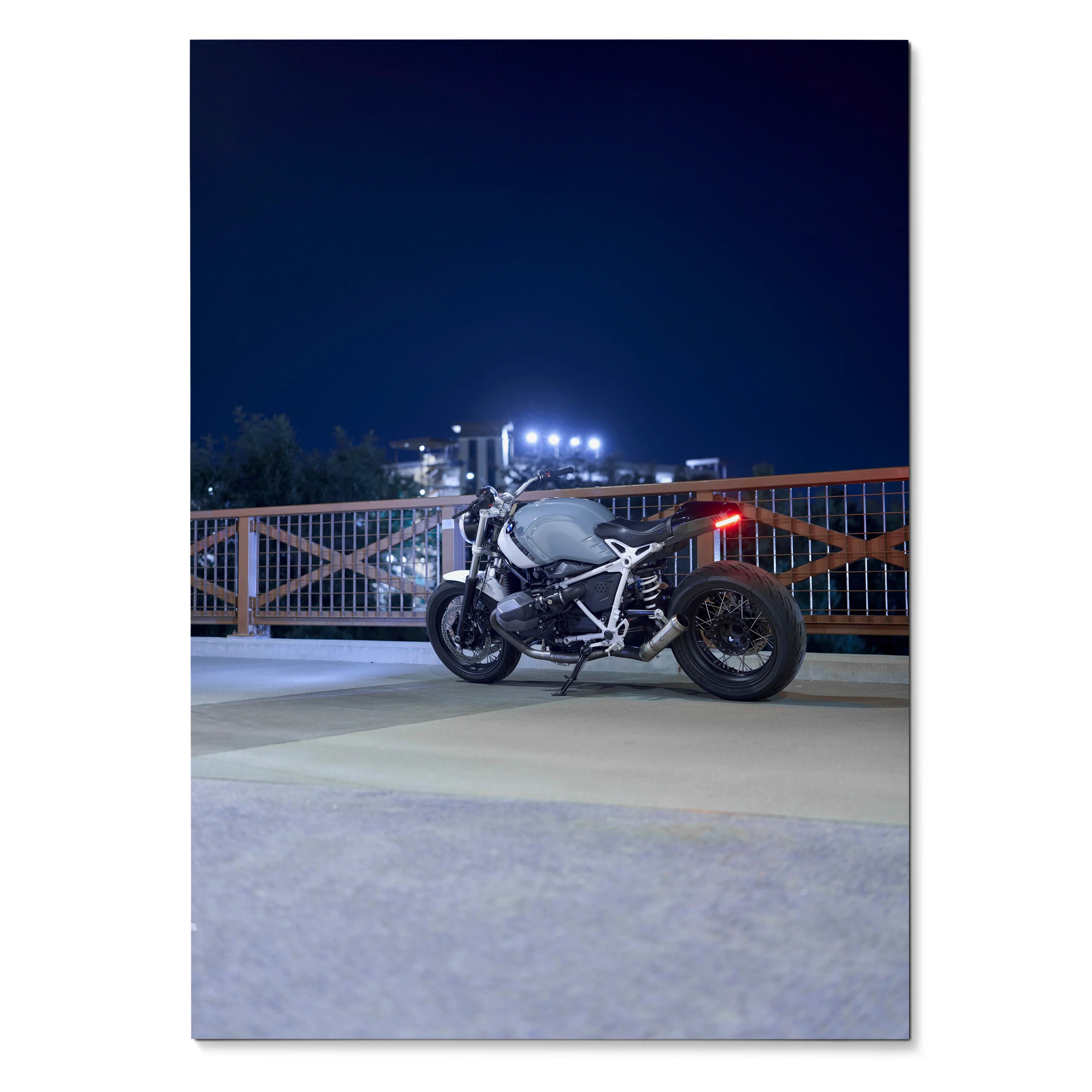 BMW R Nine T Night Ride poster featuring a motorcycle with glowing lights against a dark night background wall art.