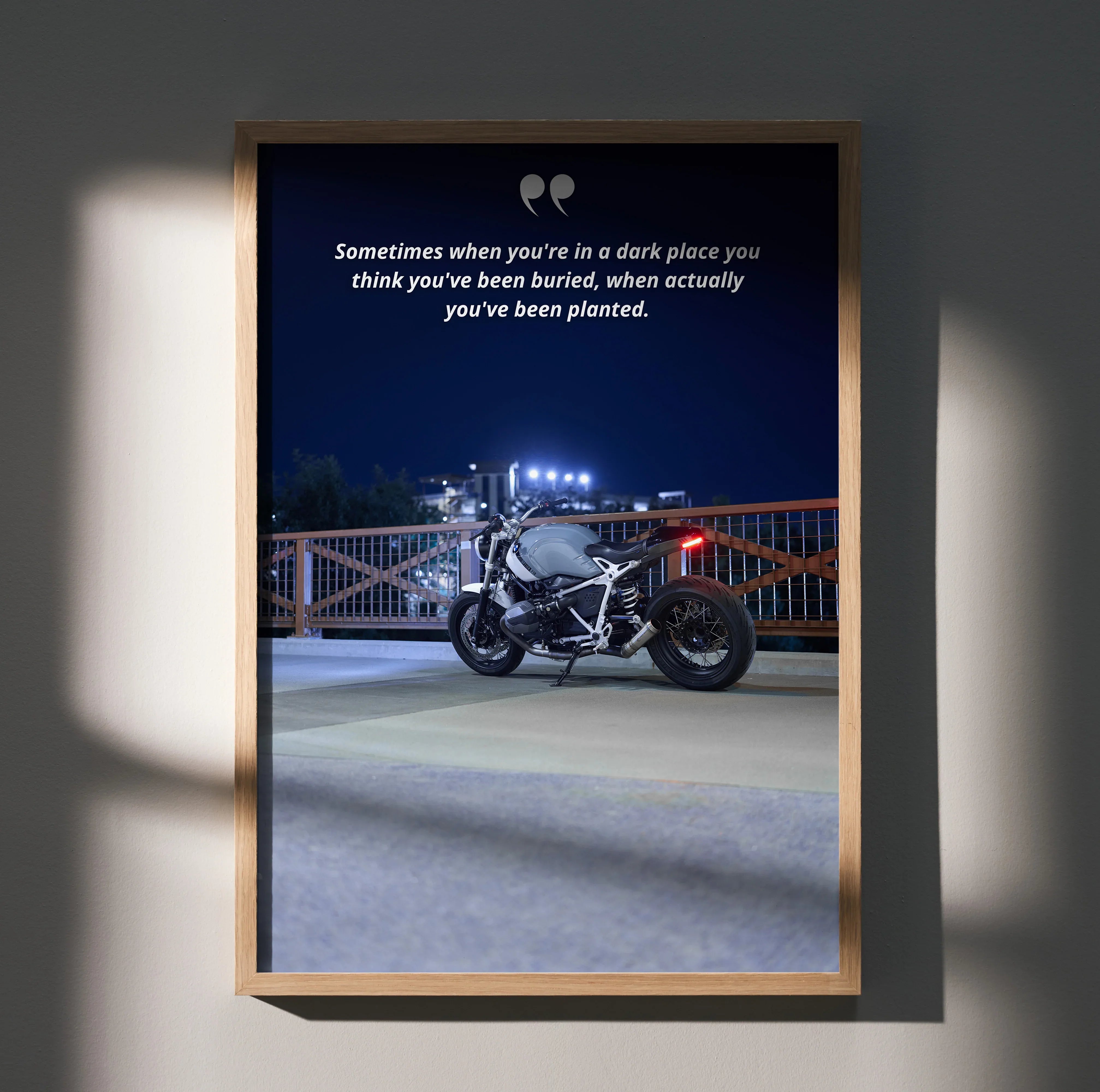 Motivational poster wall art featuring BMW R Nine T motorcycle on rooftop at night with inspiring text.