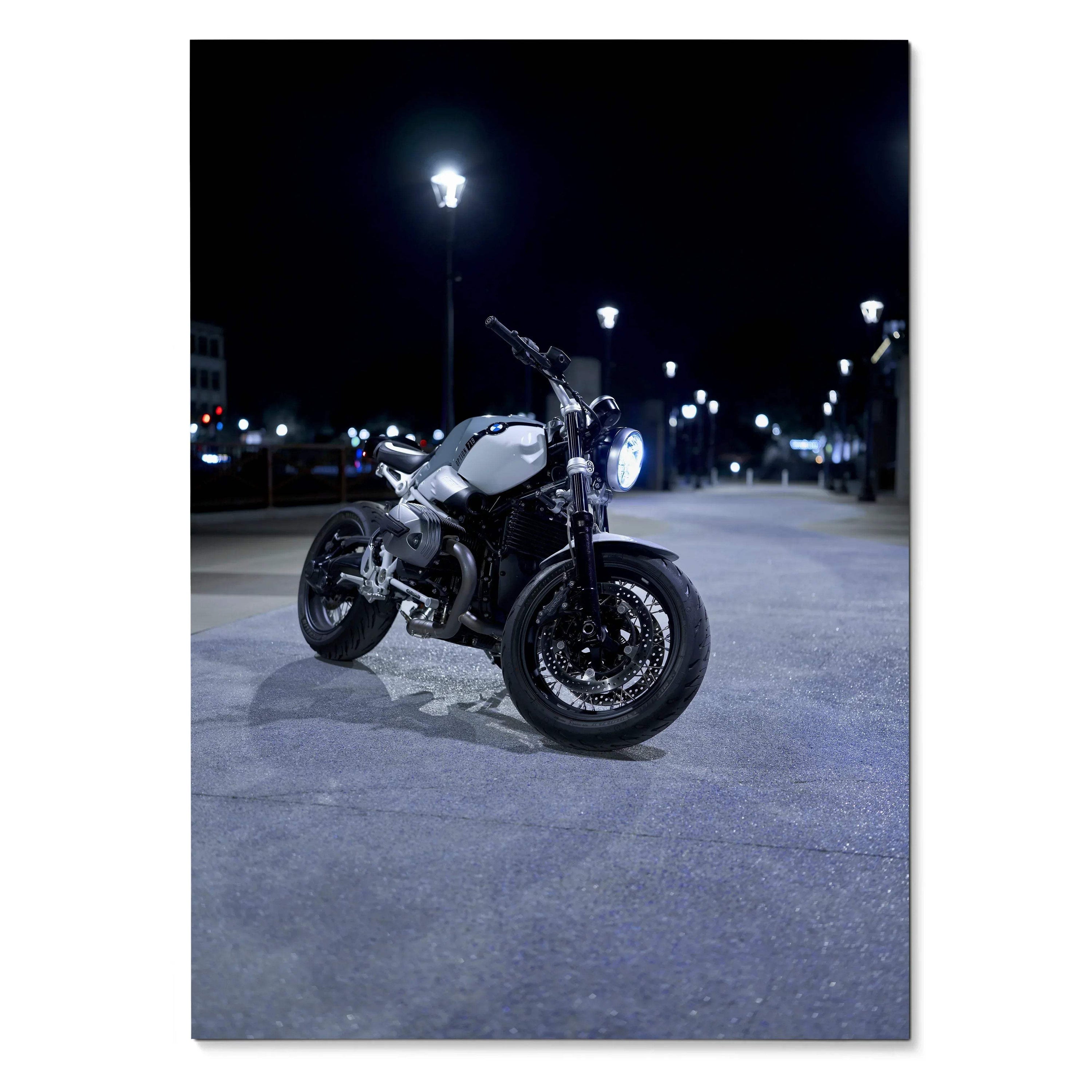 BMW R Nine T motorcycle parked at night under streetlights poster wall art.