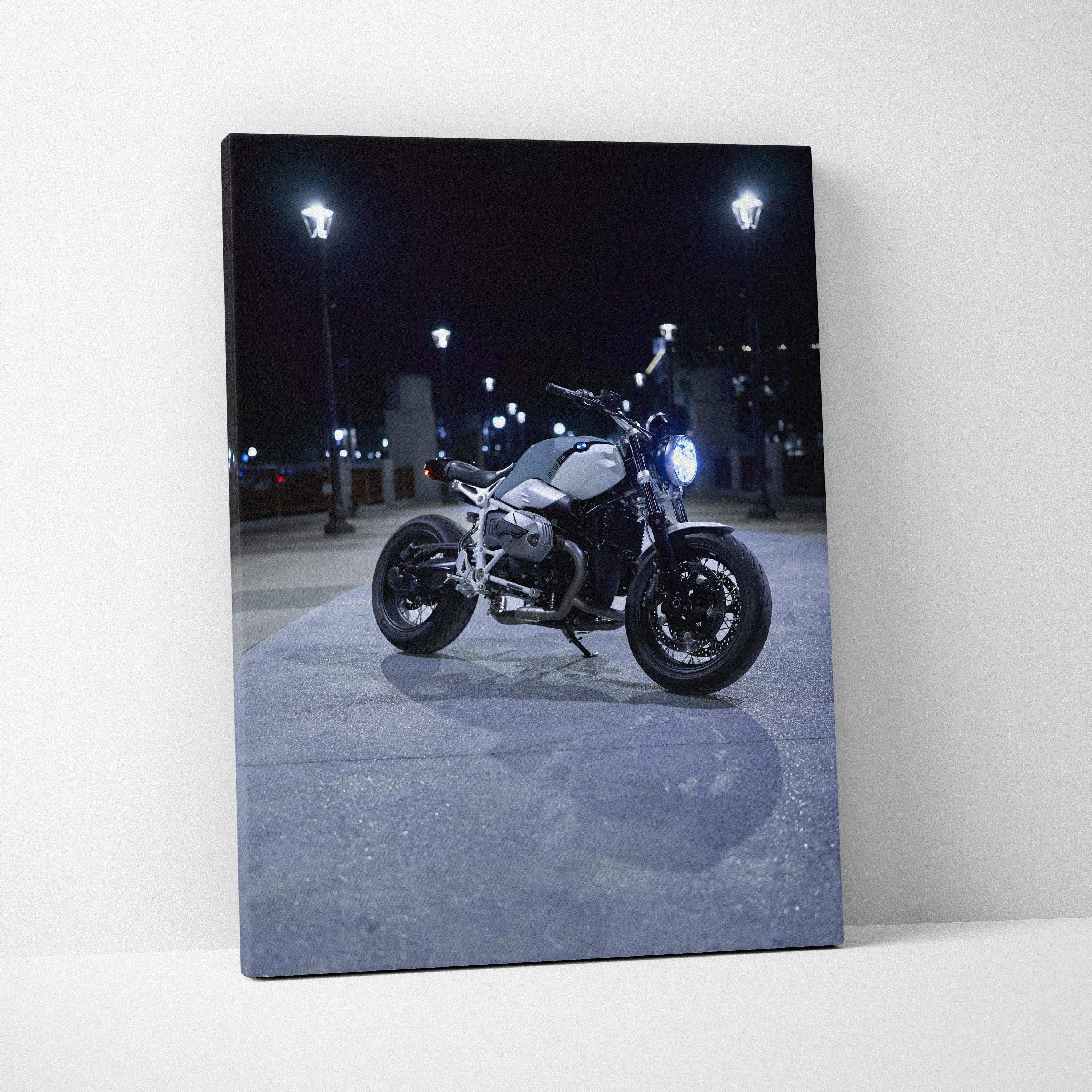 BMW R Nine T motorcycle wall art canvas print with night city lighting, vertical format.