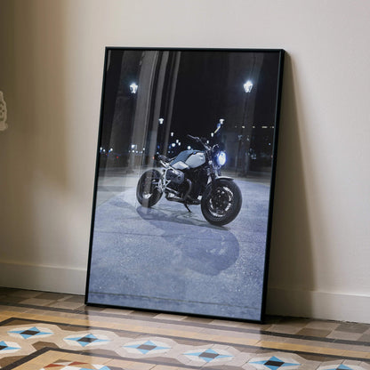 BMW R Nine T motorcycle poster with nighttime urban scene, black frame wall art.