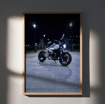 BMW R Nine T motorcycle illuminated at night poster wall art in wooden frame.