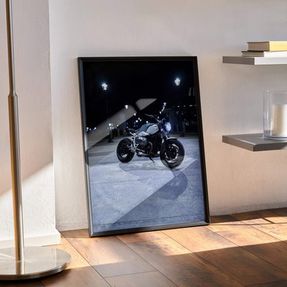 BMW R Nine T motorcycle poster with night street scene, black frame wall art.