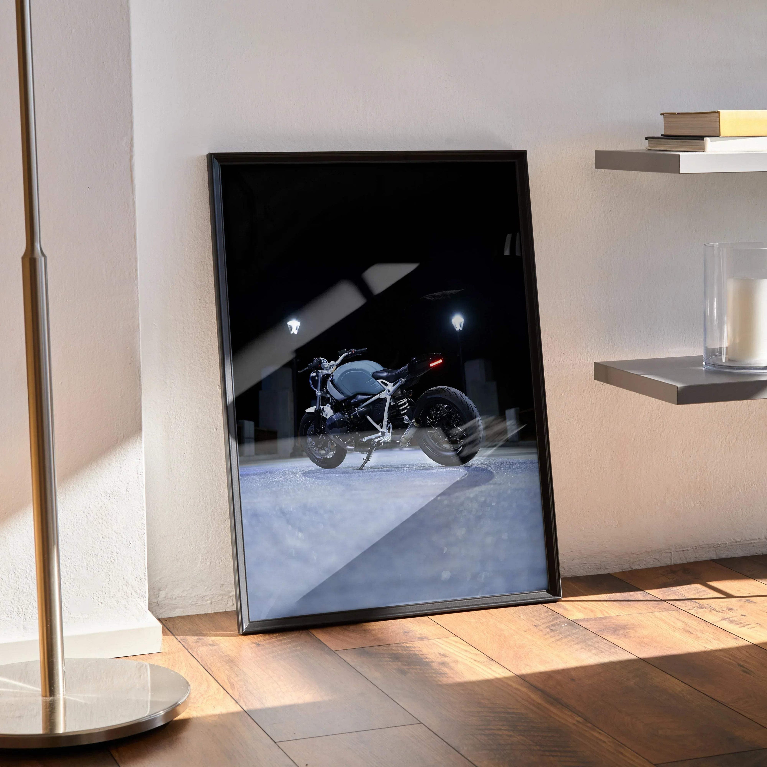 BMW R Nine T motorcycle poster with sleek black frame leaning on wooden floor wall art.