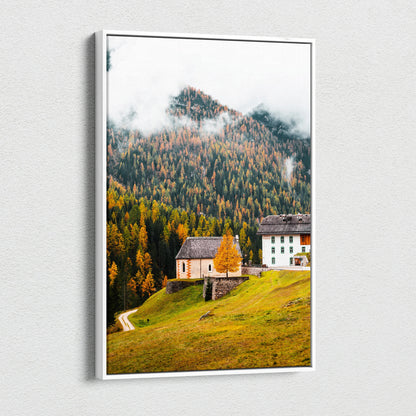 Canvas wall art featuring a serene mountain village with autumn trees and misty peaks in warm tones.