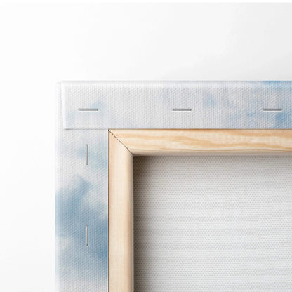Stretched canvas corner with wooden frame and blue watercolor edge detail for wall art canvas print.