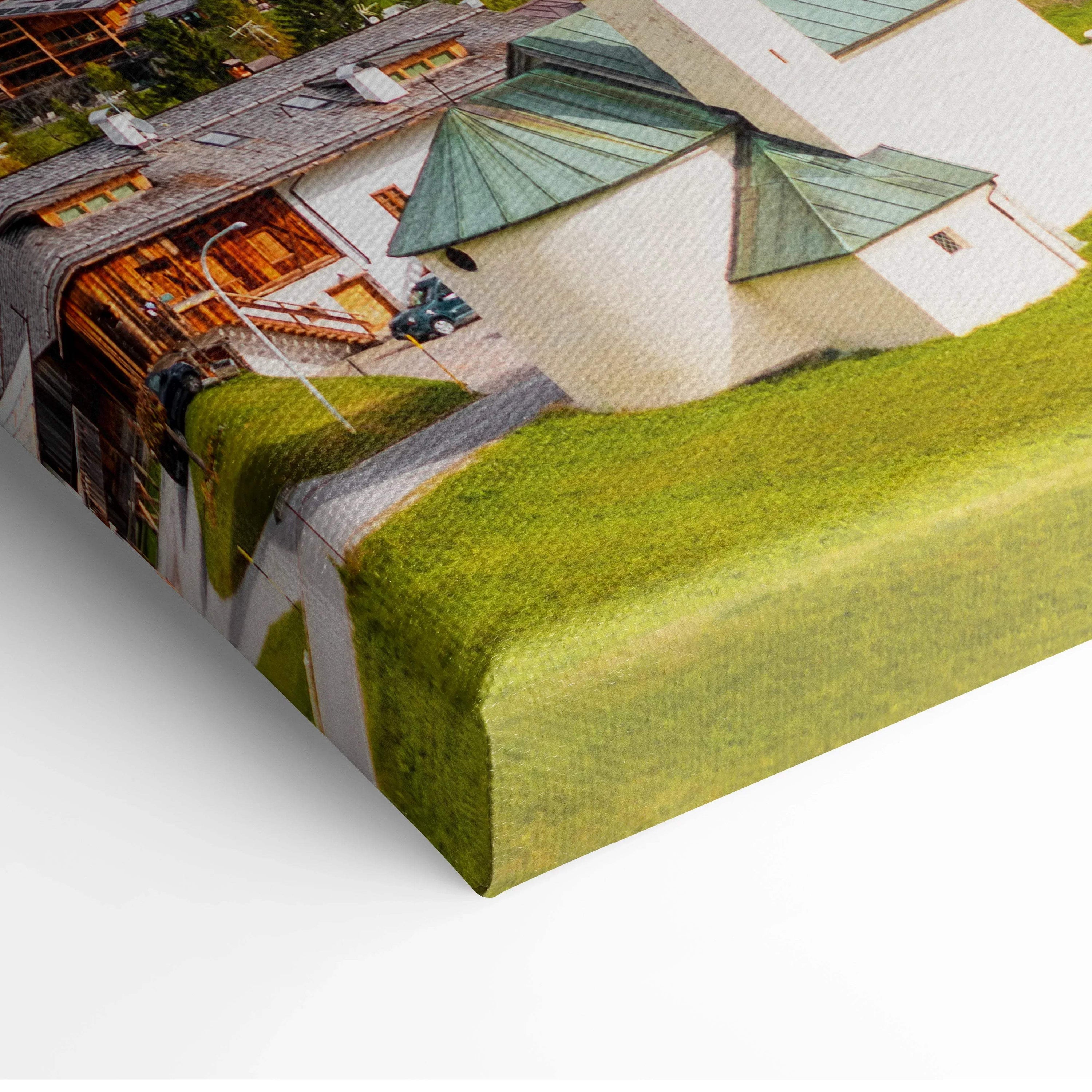 Canvas wall art featuring detailed digital print of iconic buildings with green rooftops and surrounding lawn.