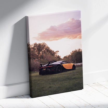 Vertical canvas wall art featuring a Bugatti Chiron at sunset with soft purple and orange sky.