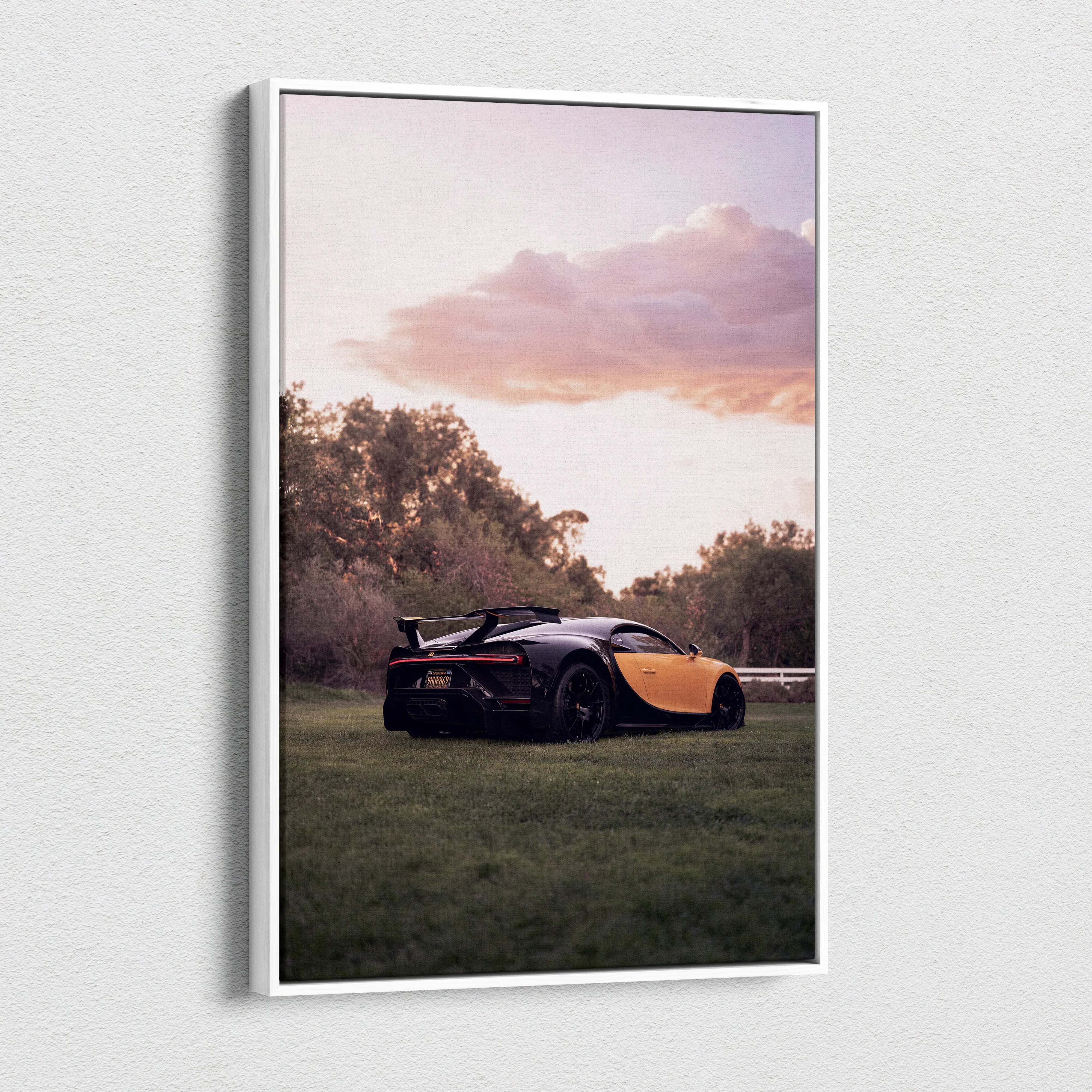 Bugatti Chiron canvas wall art with sunset background and dark sports car in a vertical format.