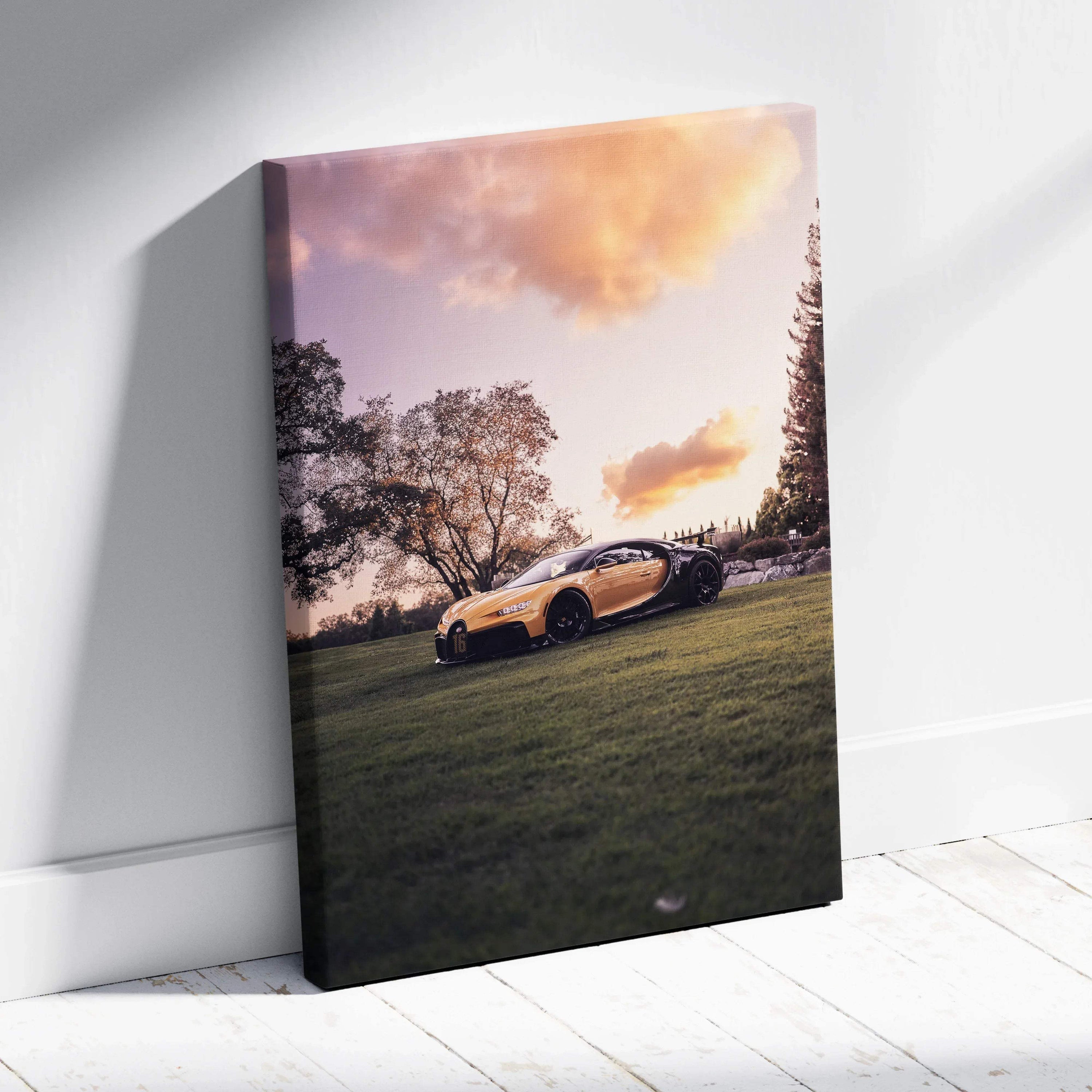 Vertical canvas wall art featuring a yellow Bugatti Chiron on grass under a cloudy sunset sky.