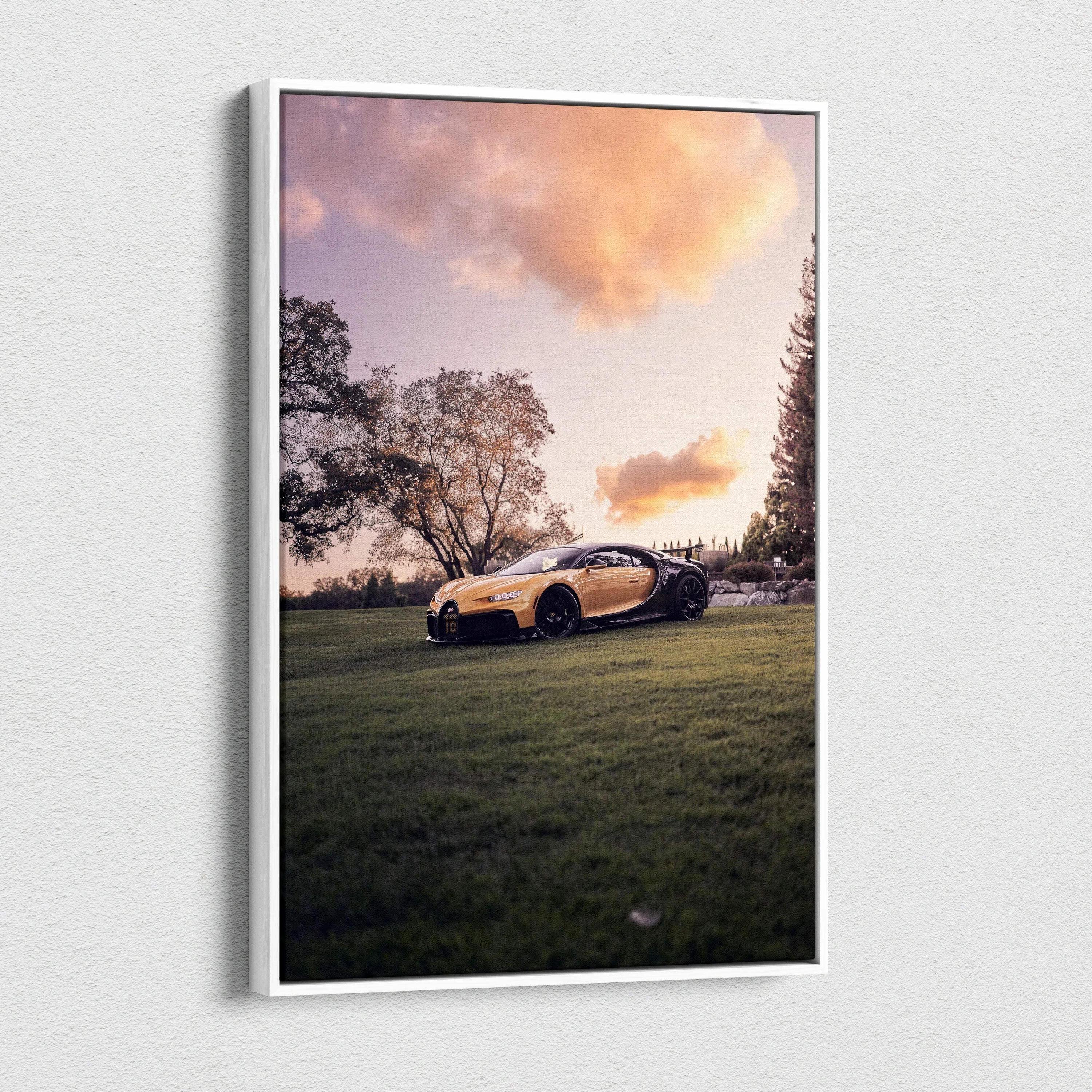 Vertical canvas wall art featuring a Bugatti Chiron on grass at sunset with vibrant sky colors.