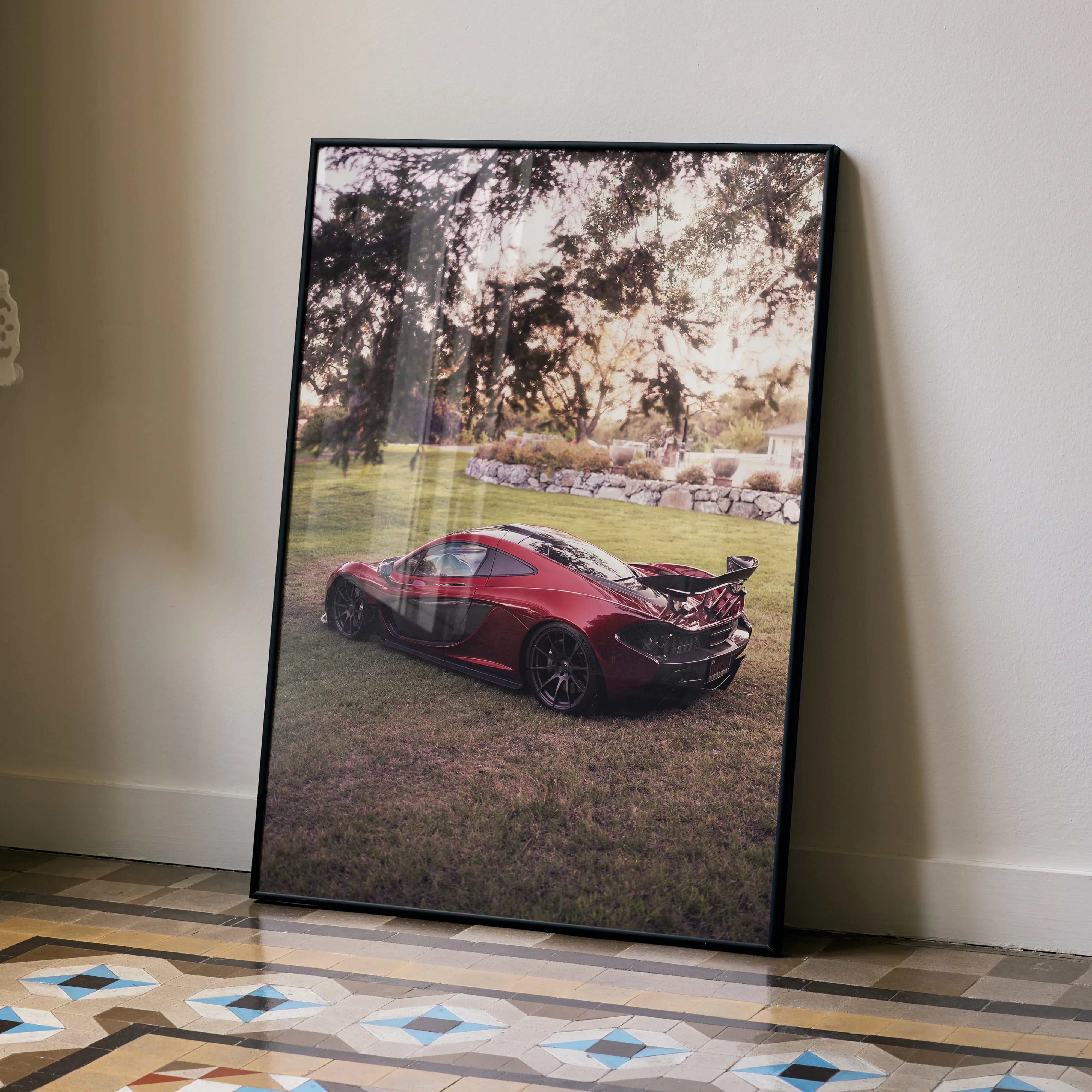 McLaren P1 red sports car poster with scenic outdoor backdrop framed wall art.