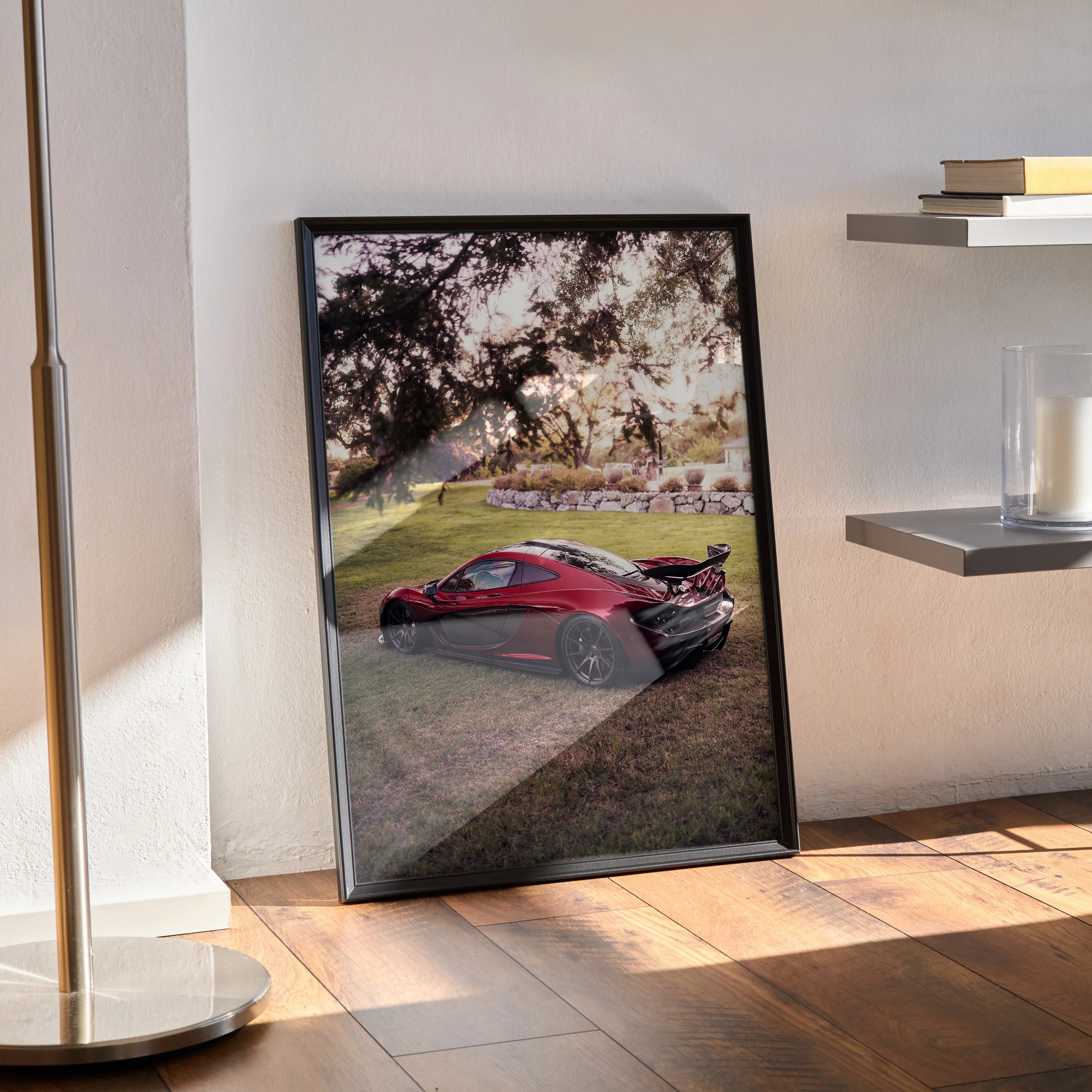 McLaren P1 poster wall art featuring detailed red sports car in outdoor setting with tree shadows.
