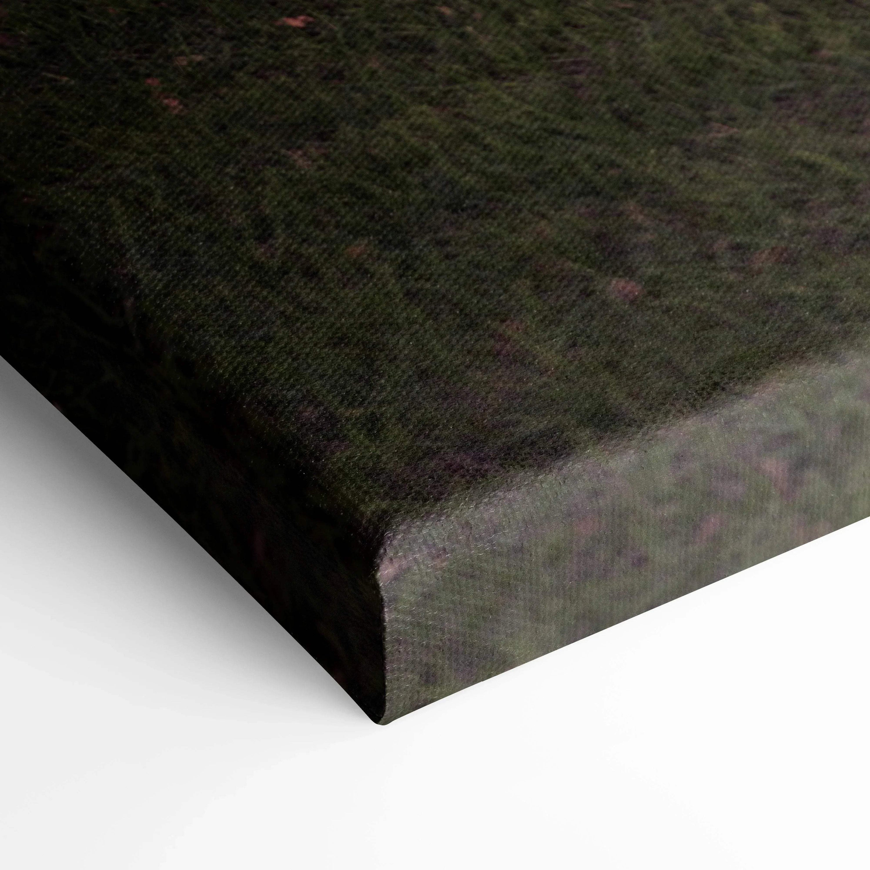 Close-up of textured black canvas wall art stretched on wooden frame, vertical canvas art.