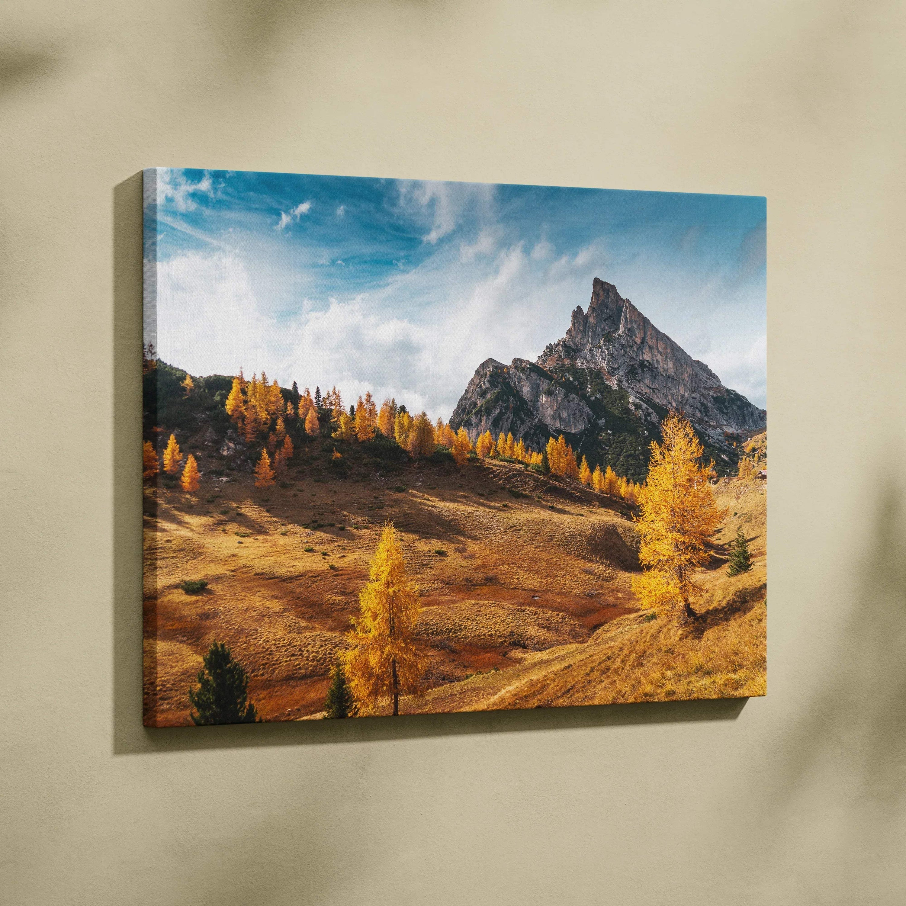Autumn mountain canvas wall art with vibrant fall foliage and sharp peaks under blue sky.