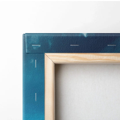 Close-up of wooden frame and blue canvas edge for autumn mountains wall art print.