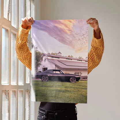Poster of a black 1969 Camaro parked in front of a retro trailer at sunset, wall art.