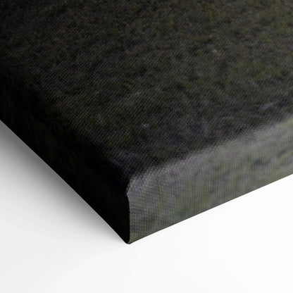 Close-up of dark canvas texture and wrapped edge of vertical wall art print.