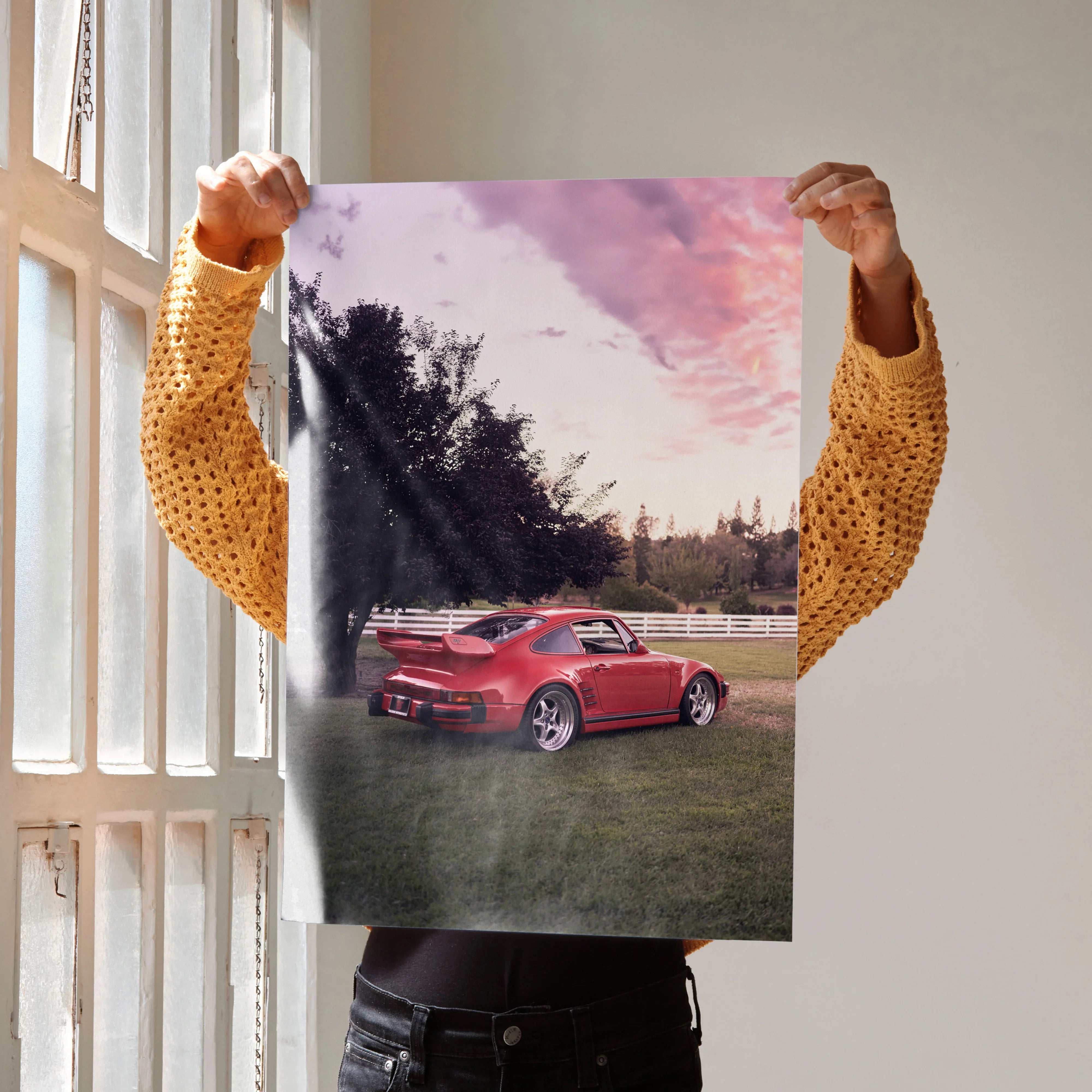 Poster of red Porsche 911 Turbo Slant-Nose at sunset with vibrant sky, automotive wall art.