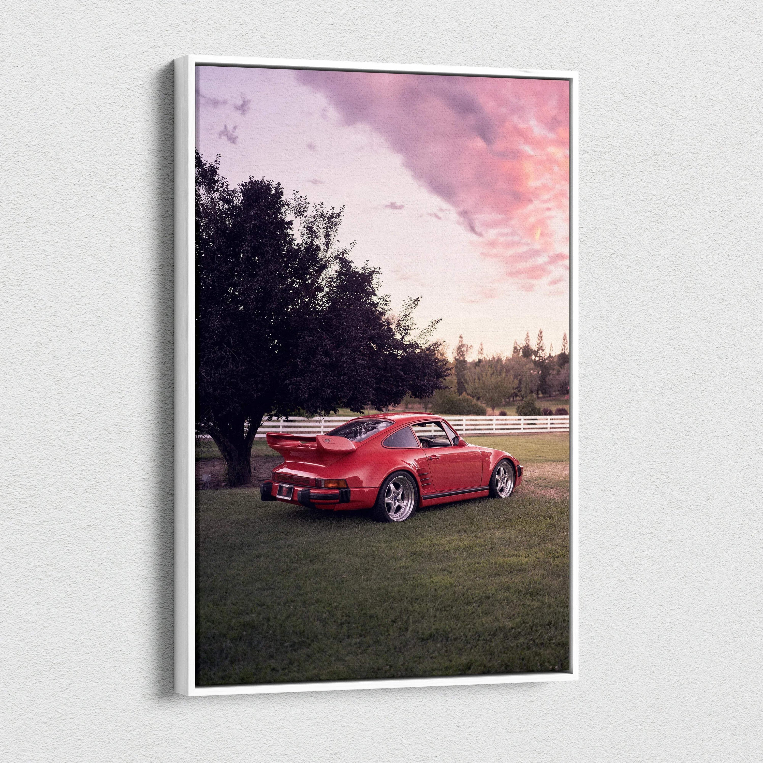 Red Porsche 911 Turbo Slant-Nose parked on grass at sunset canvas wall art.