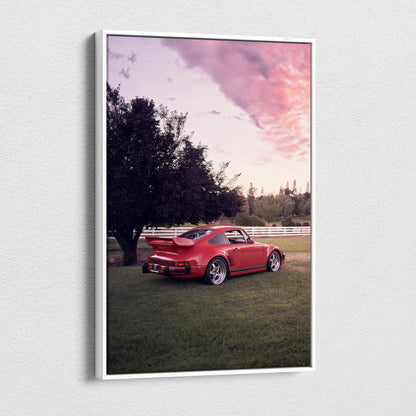 Red Porsche 911 Turbo Slant-Nose parked on grass at sunset canvas wall art.