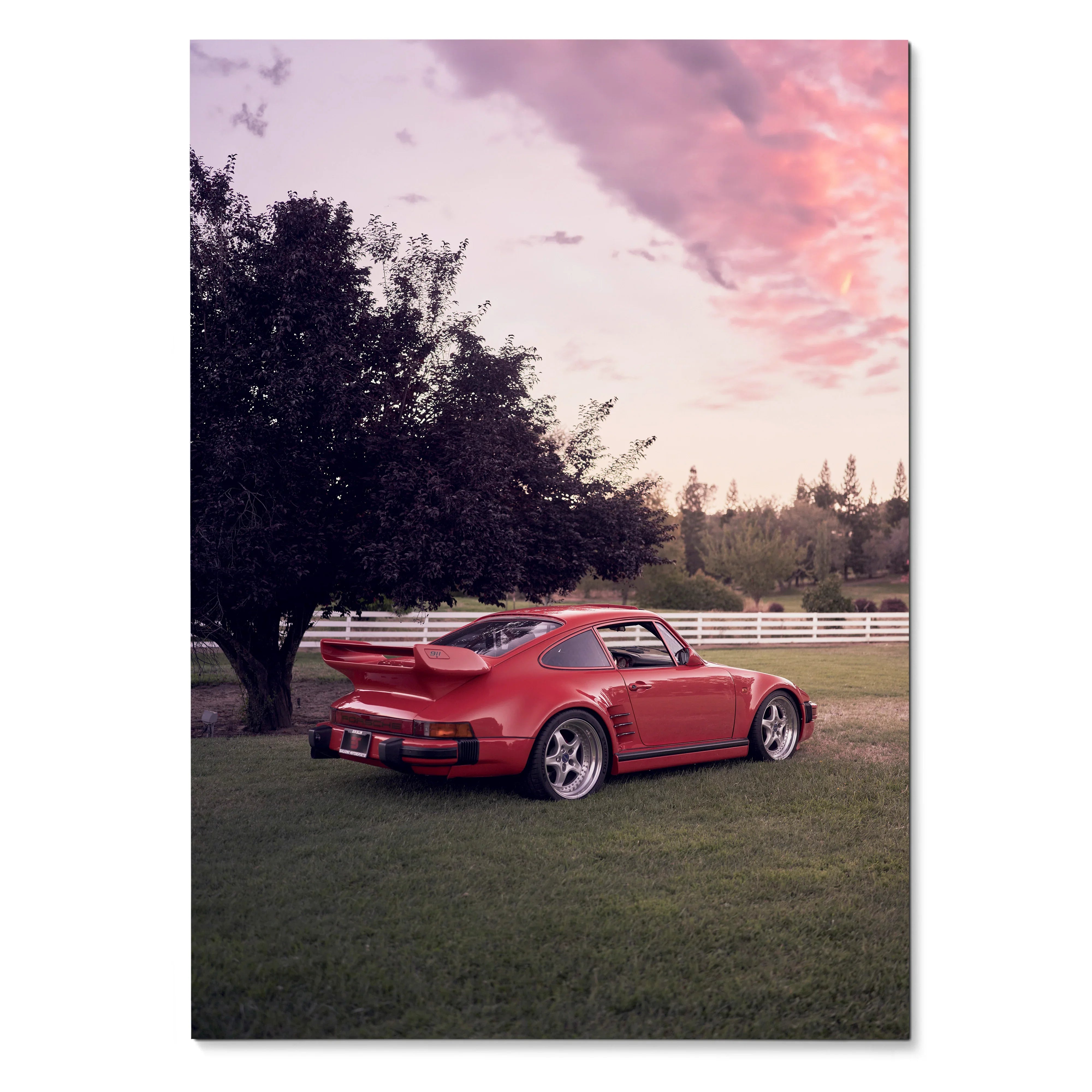 Red Porsche 911 Turbo Slant-Nose parked on grass with sunset sky Poster Wall Art.