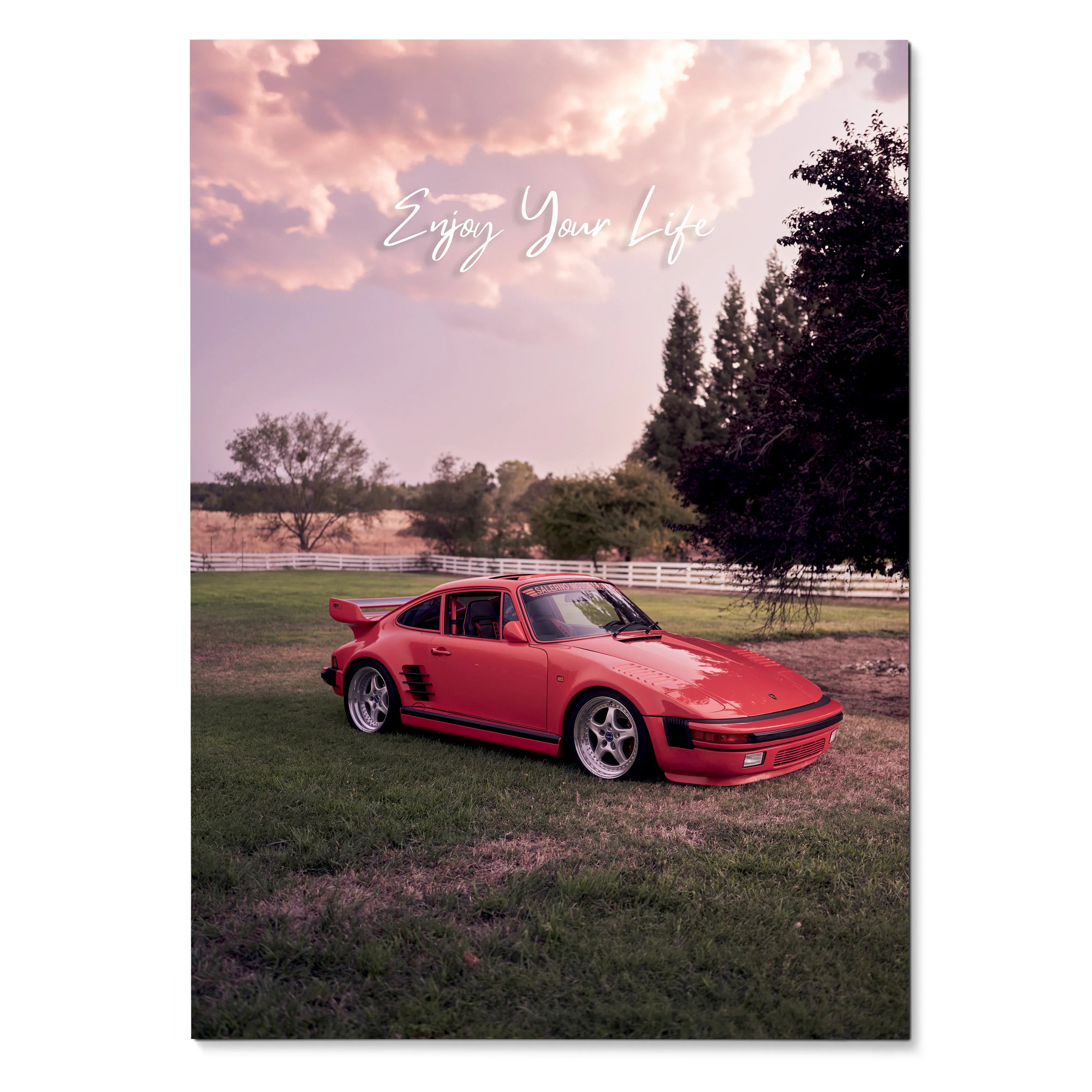 Poster wall art featuring a red Porsche 911 Turbo Slant-Nose on grass under a pink sky with trees.