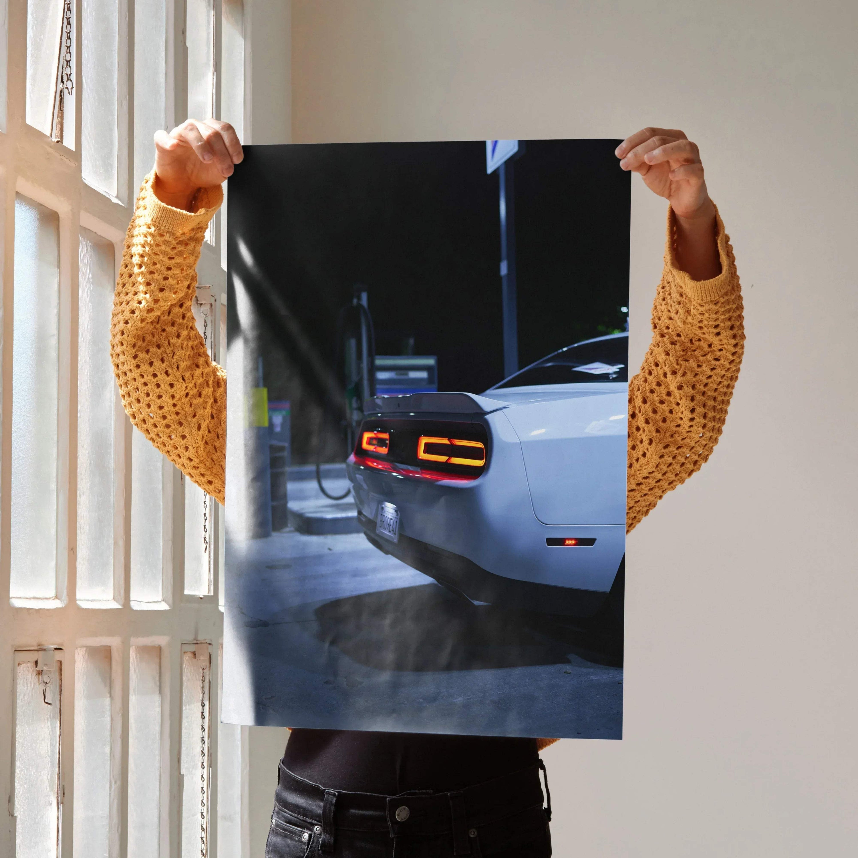 Dodge Challenger rear view illuminated taillights nighttime poster wall art.