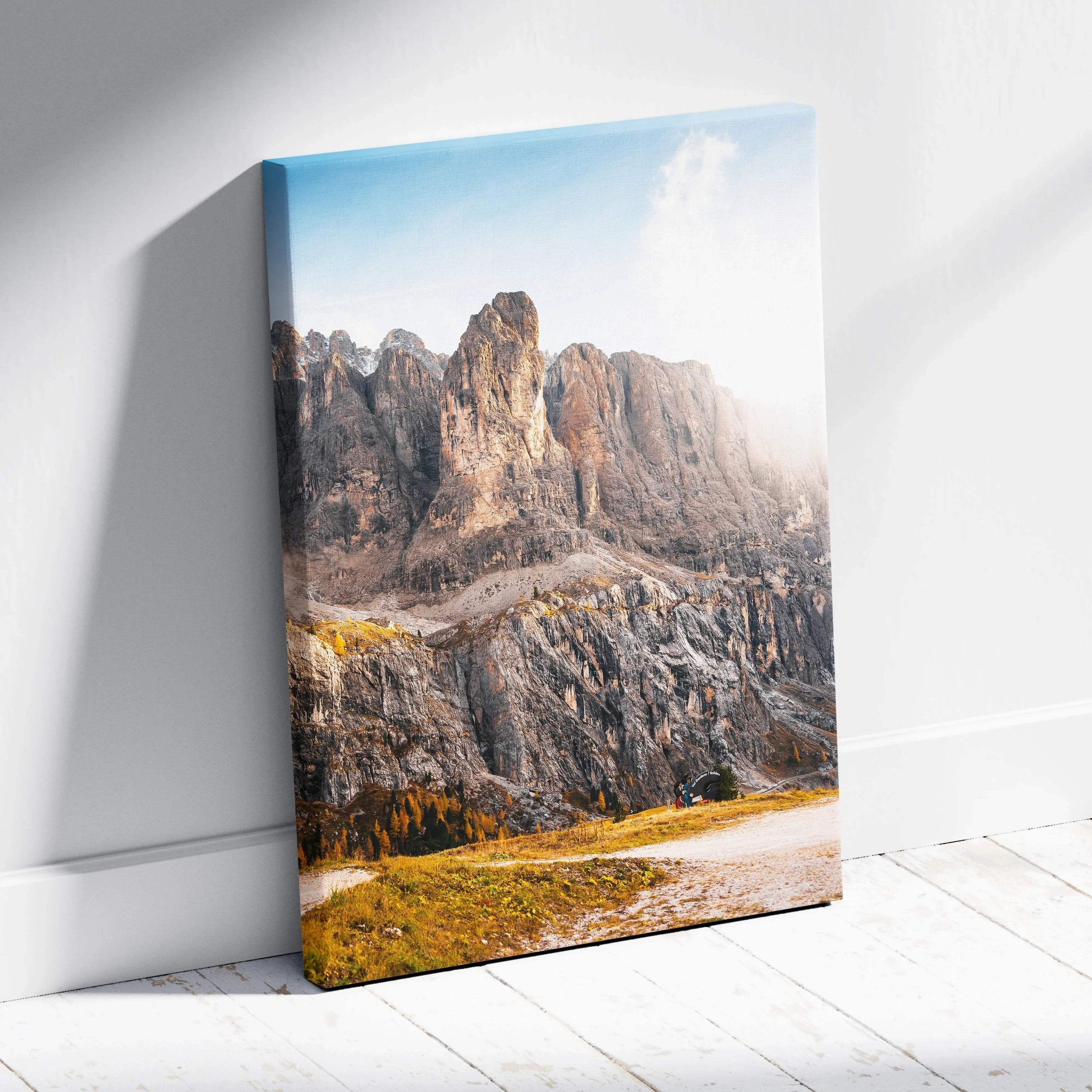 Vertical canvas wall art featuring autumn mountains with rocky cliffs and golden foliage under a blue sky.