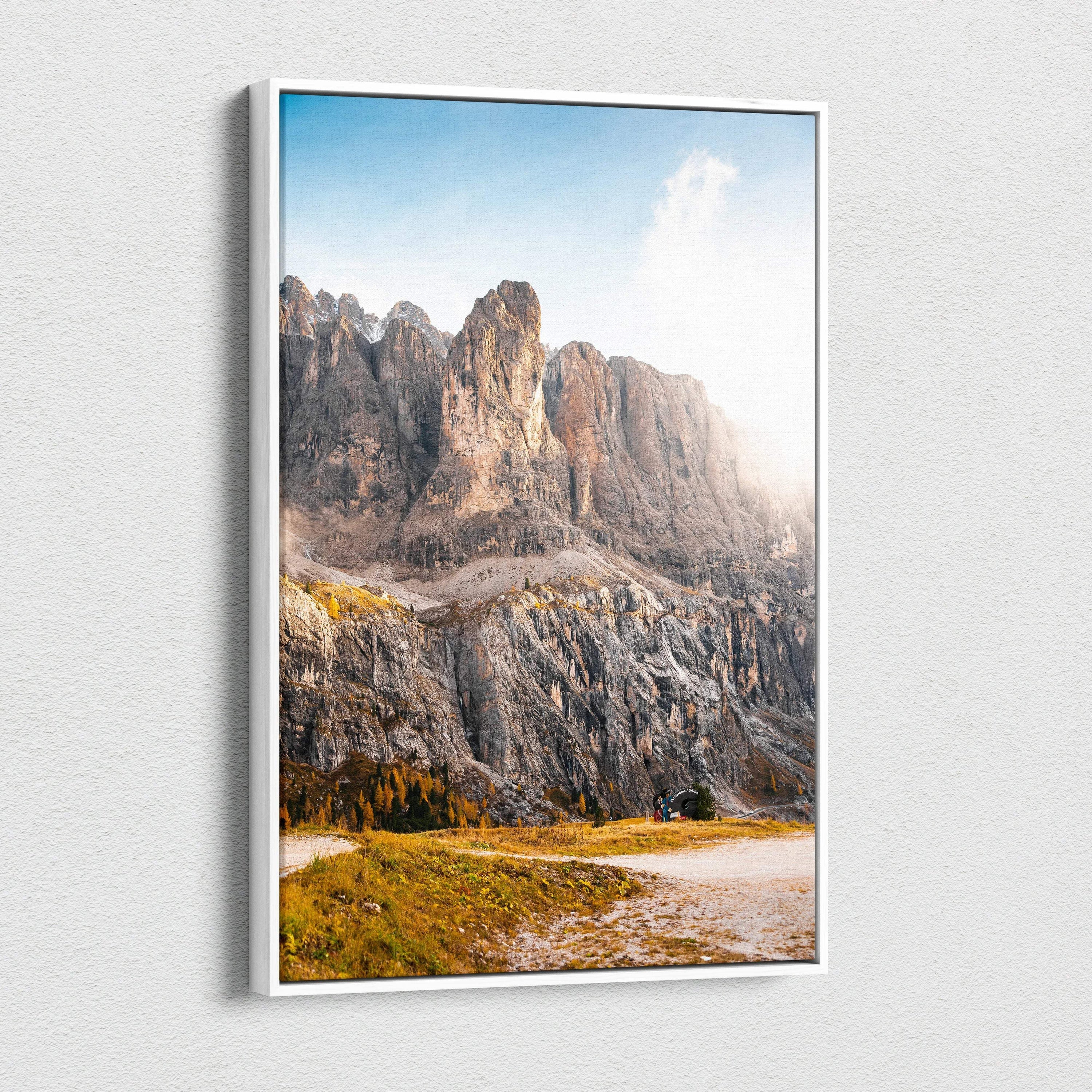 Vertical canvas wall art print featuring rugged autumn mountains under a clear blue sky.