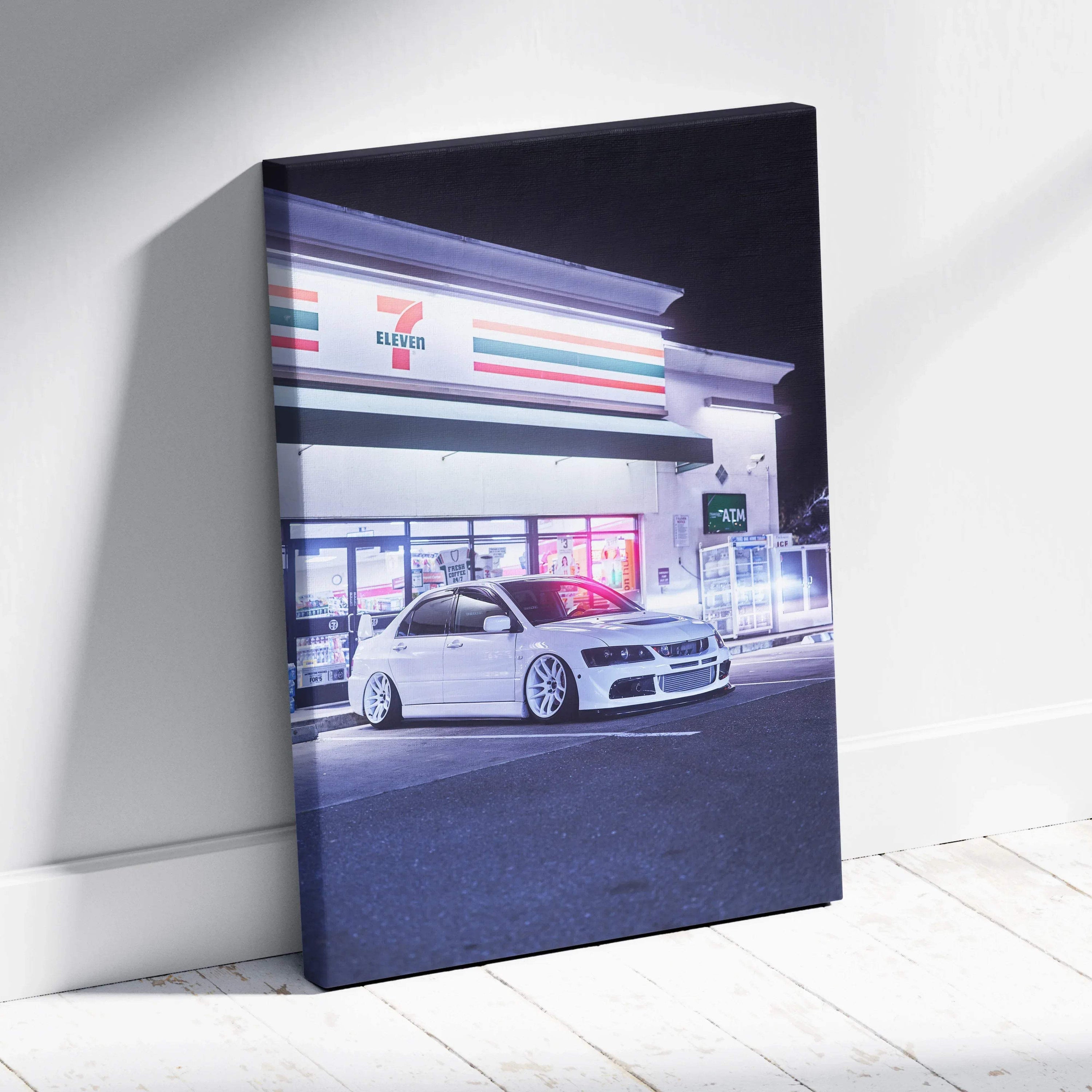 Mitsubishi Evo 8 parked outside illuminated store at night canvas wall art.