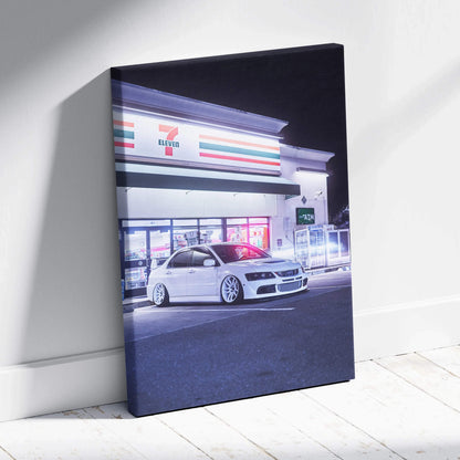 Mitsubishi Evo 8 parked outside illuminated store at night canvas wall art.