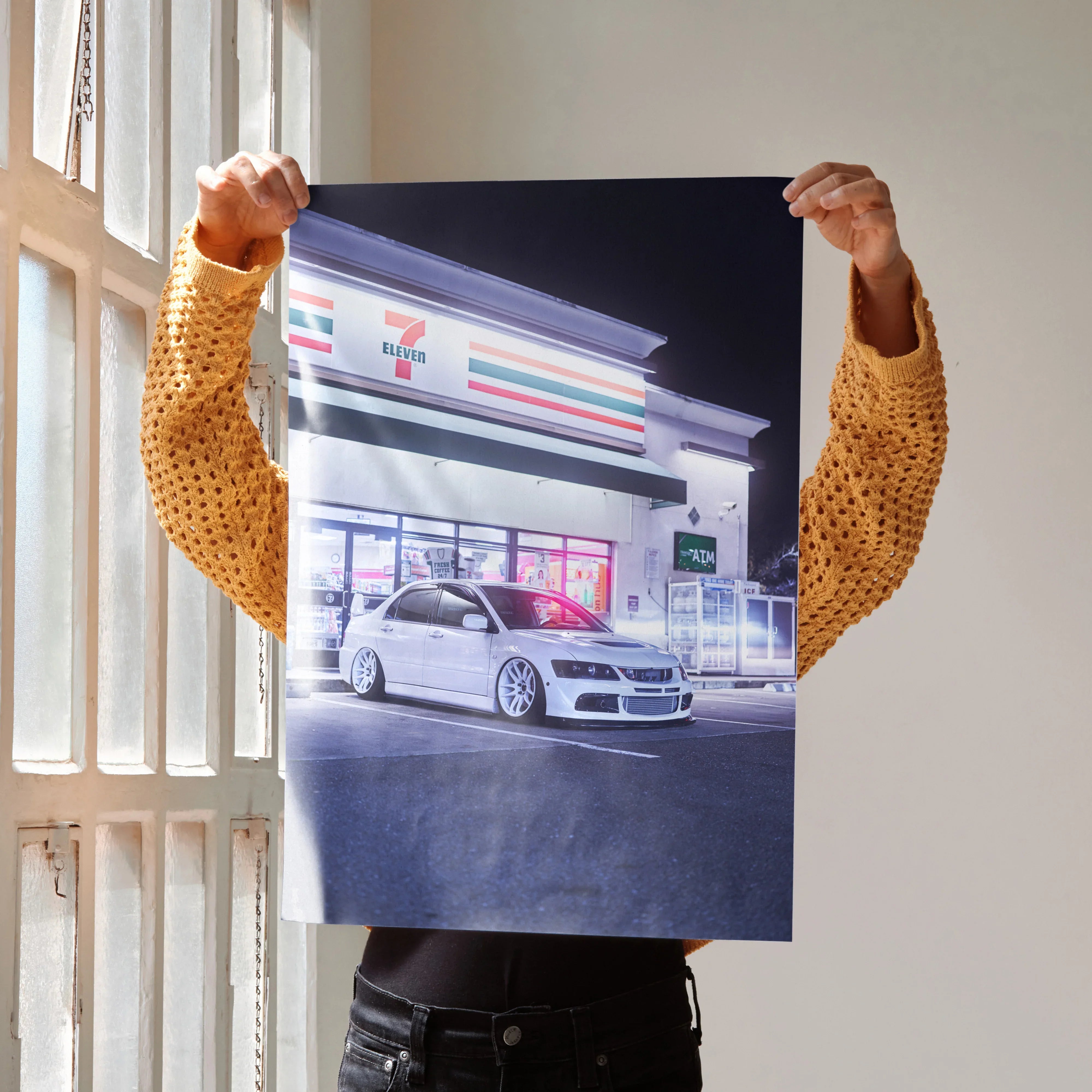 Mitsubishi Evo 8 poster with high-resolution car art in front of illuminated 7-Eleven, wall art print.