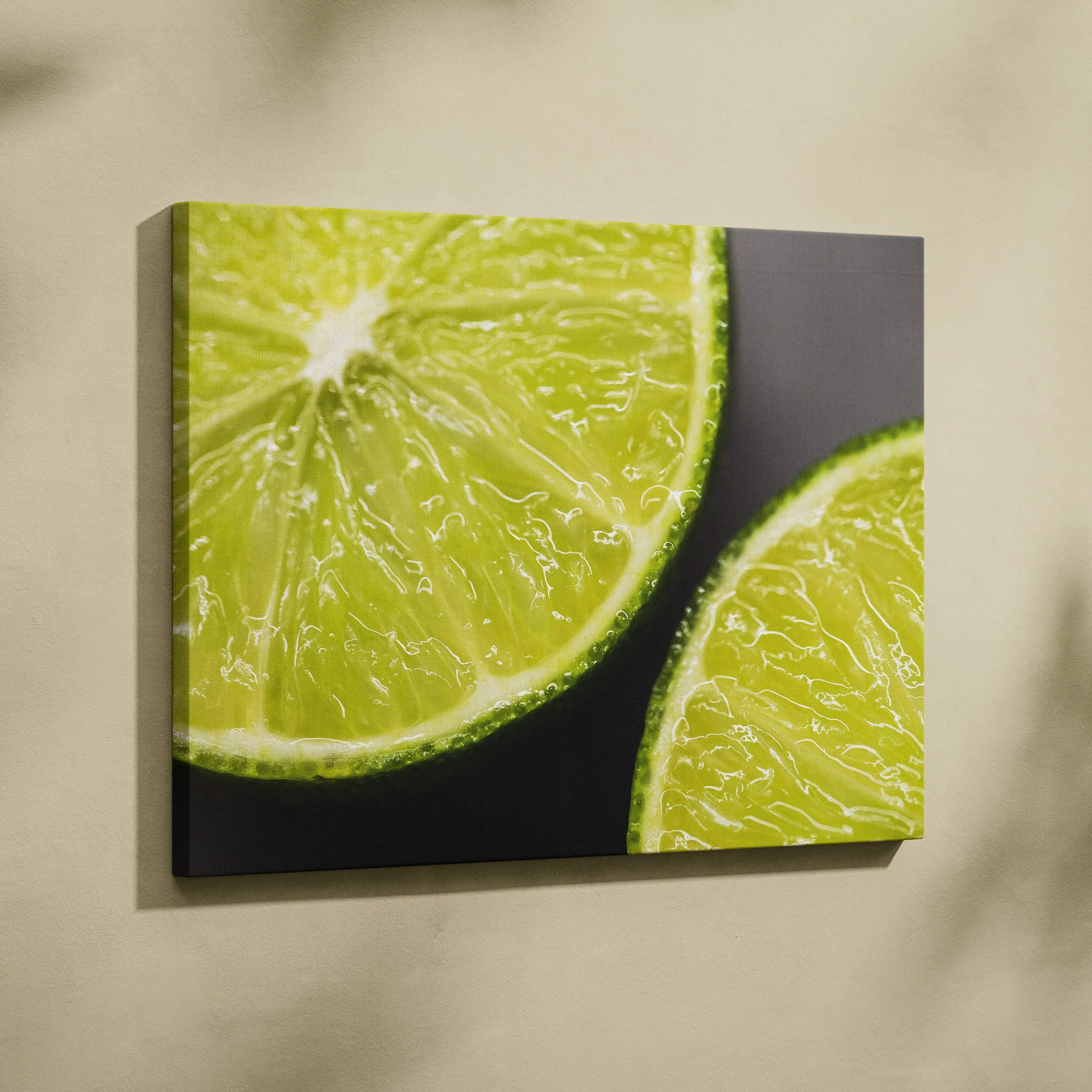 High-resolution canvas wall art featuring close-up of bright green juicy lime slices with textured pulp and dark background.