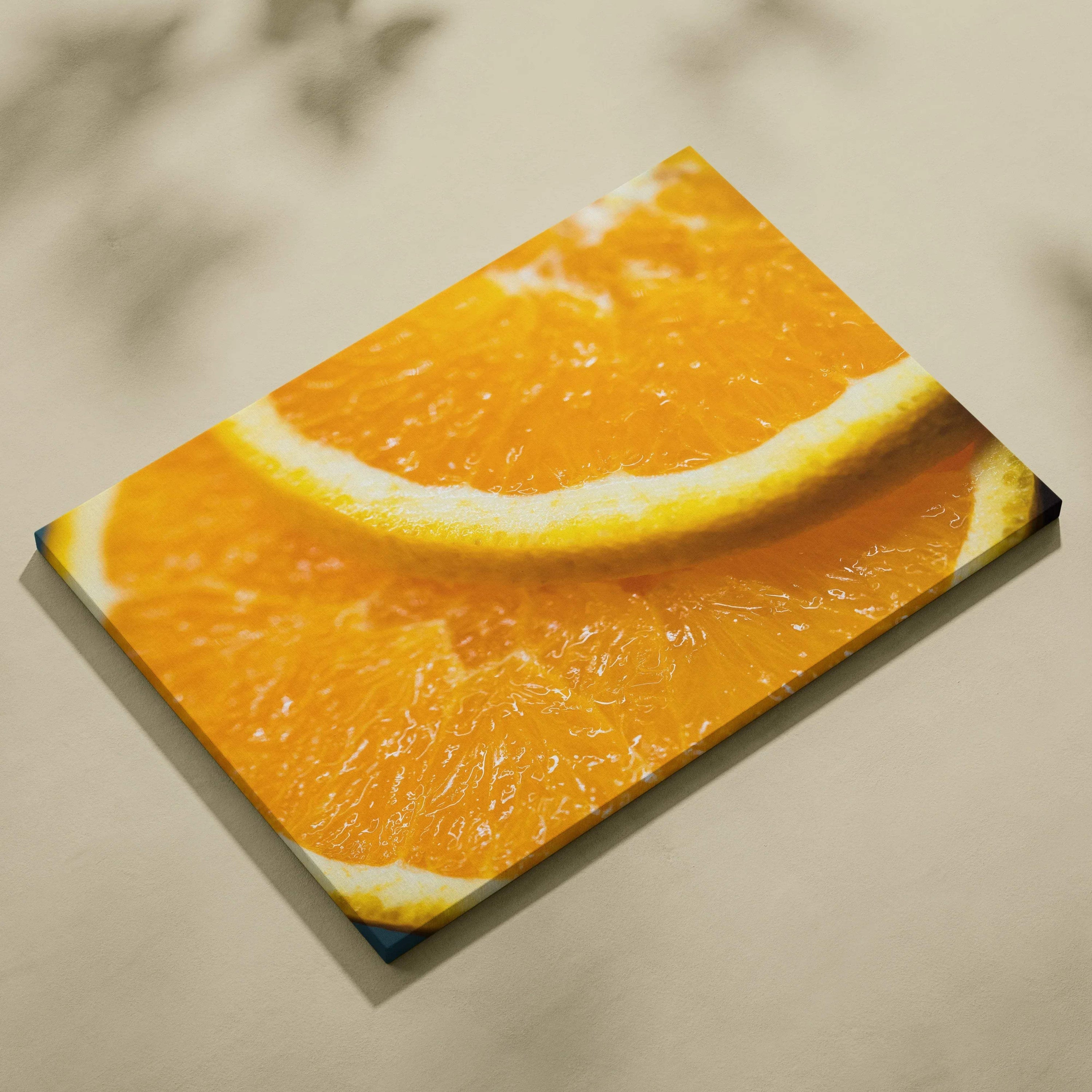 Canvas wall art featuring a close-up of vibrant juicy orange slices, perfect decor for kitchen or dining space.