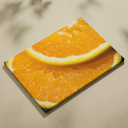 Canvas wall art featuring a close-up of vibrant juicy orange slices, perfect decor for kitchen or dining space.