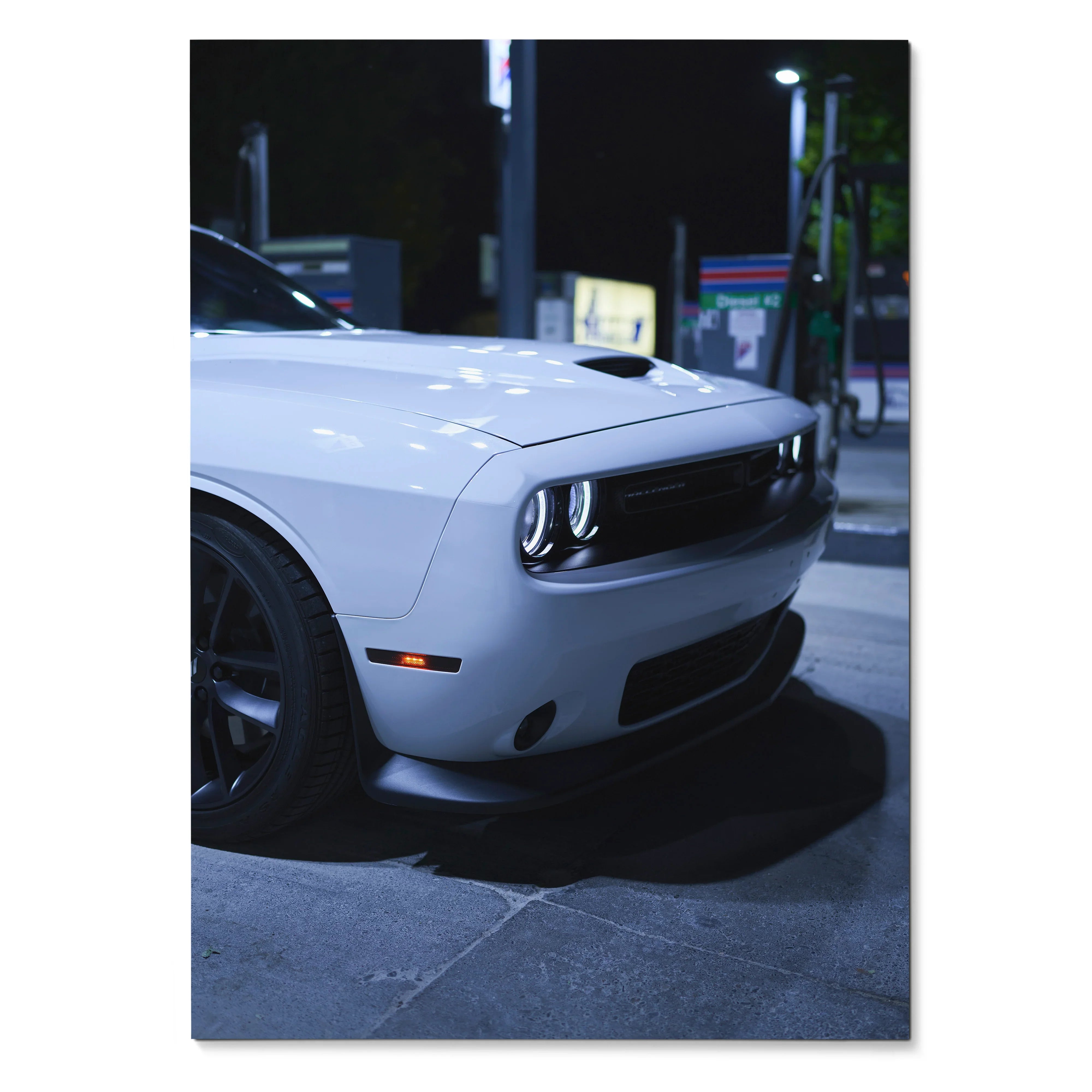 Dodge Challenger front view at night poster wall art with sleek white muscle car details.