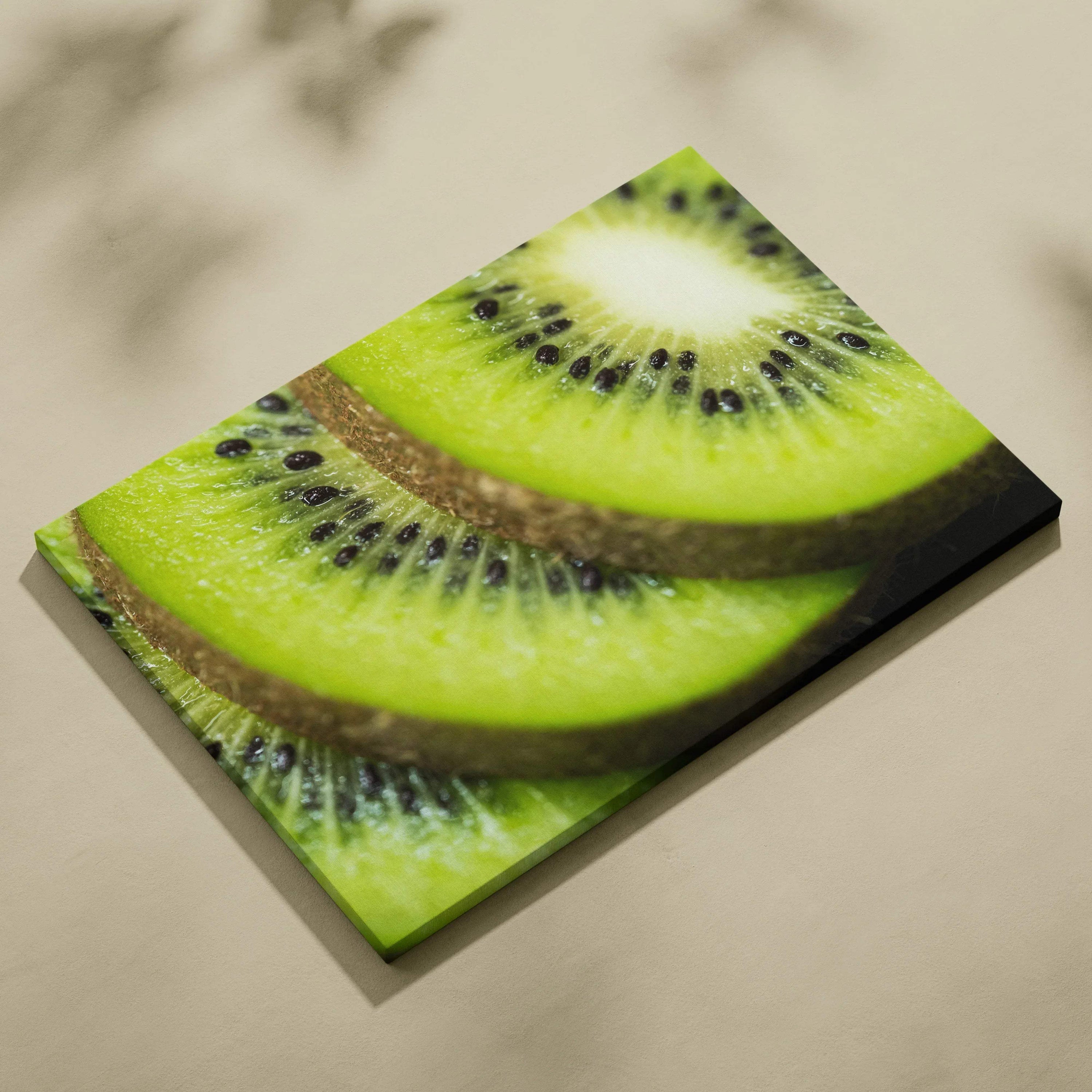 High-resolution canvas wall art featuring a close-up of vibrant green ripe kiwi slices with seeds, perfect for food-themed.