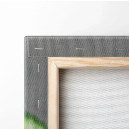 Close-up of wooden frame corner with gray stretched canvas fabric and metal staples securing fabric for wall art decor.