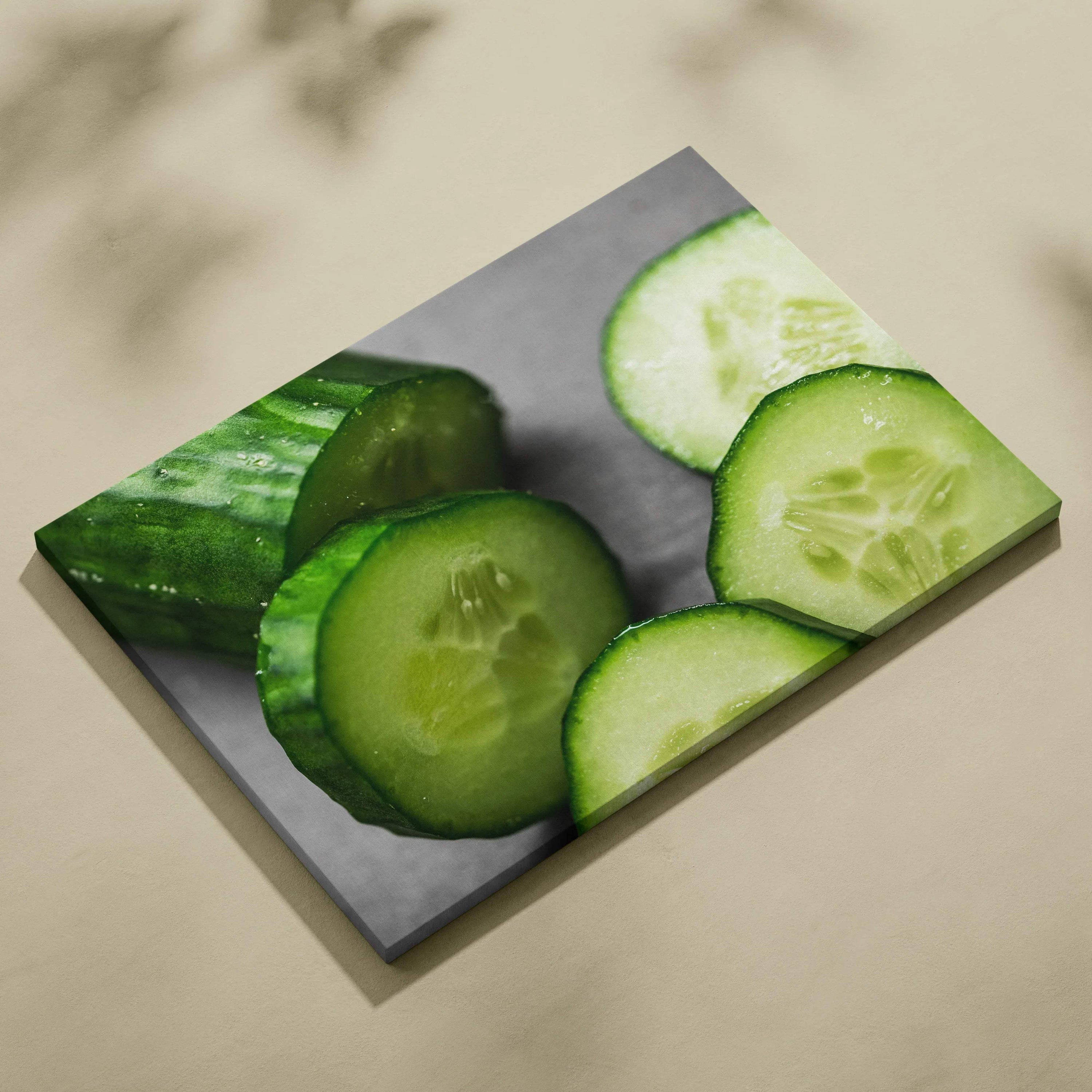 Canvas wall art featuring vibrant green cucumber slices on a gray background for fresh home decor.