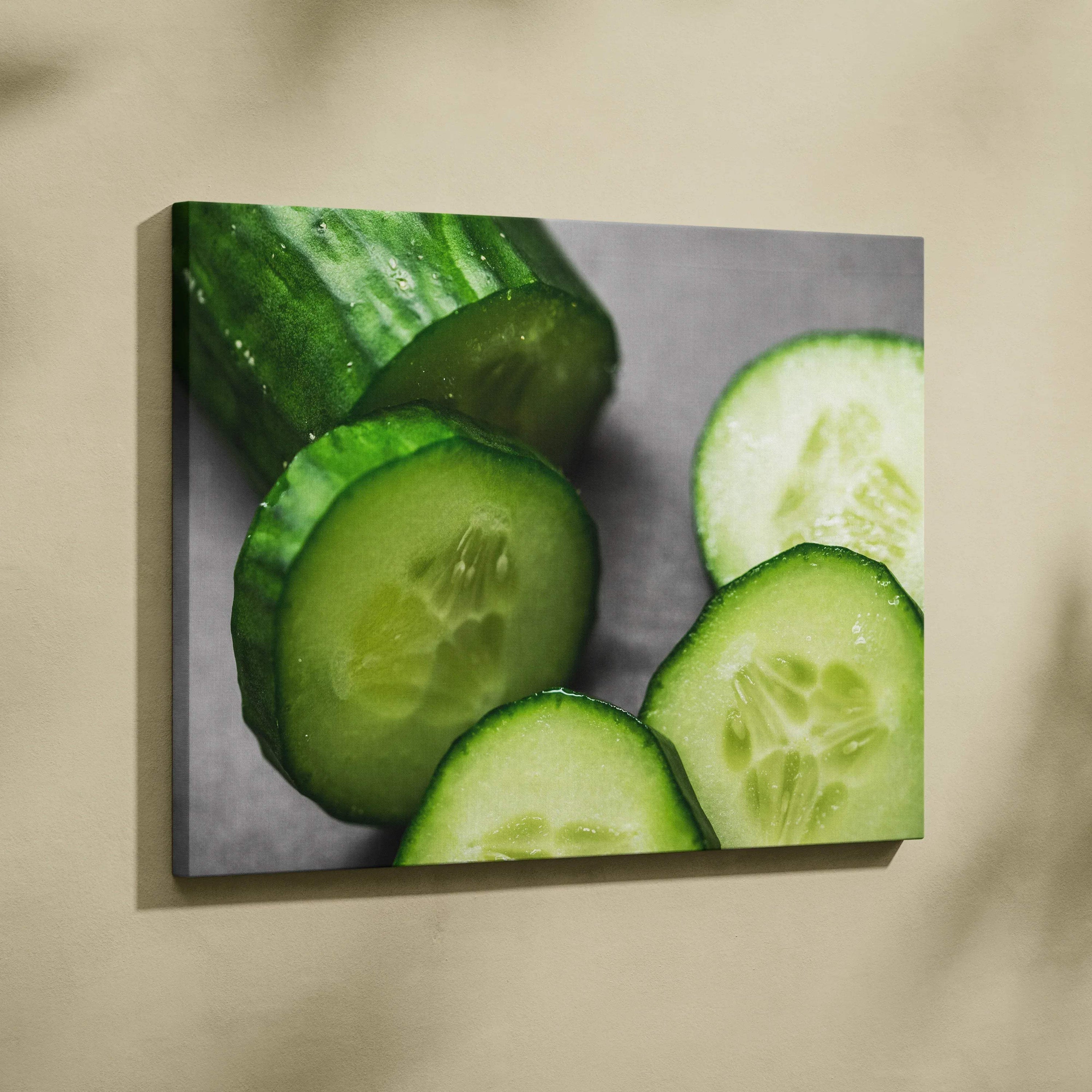 Canvas wall art featuring vibrant green cucumber slices with detailed textures and fresh, natural colors.