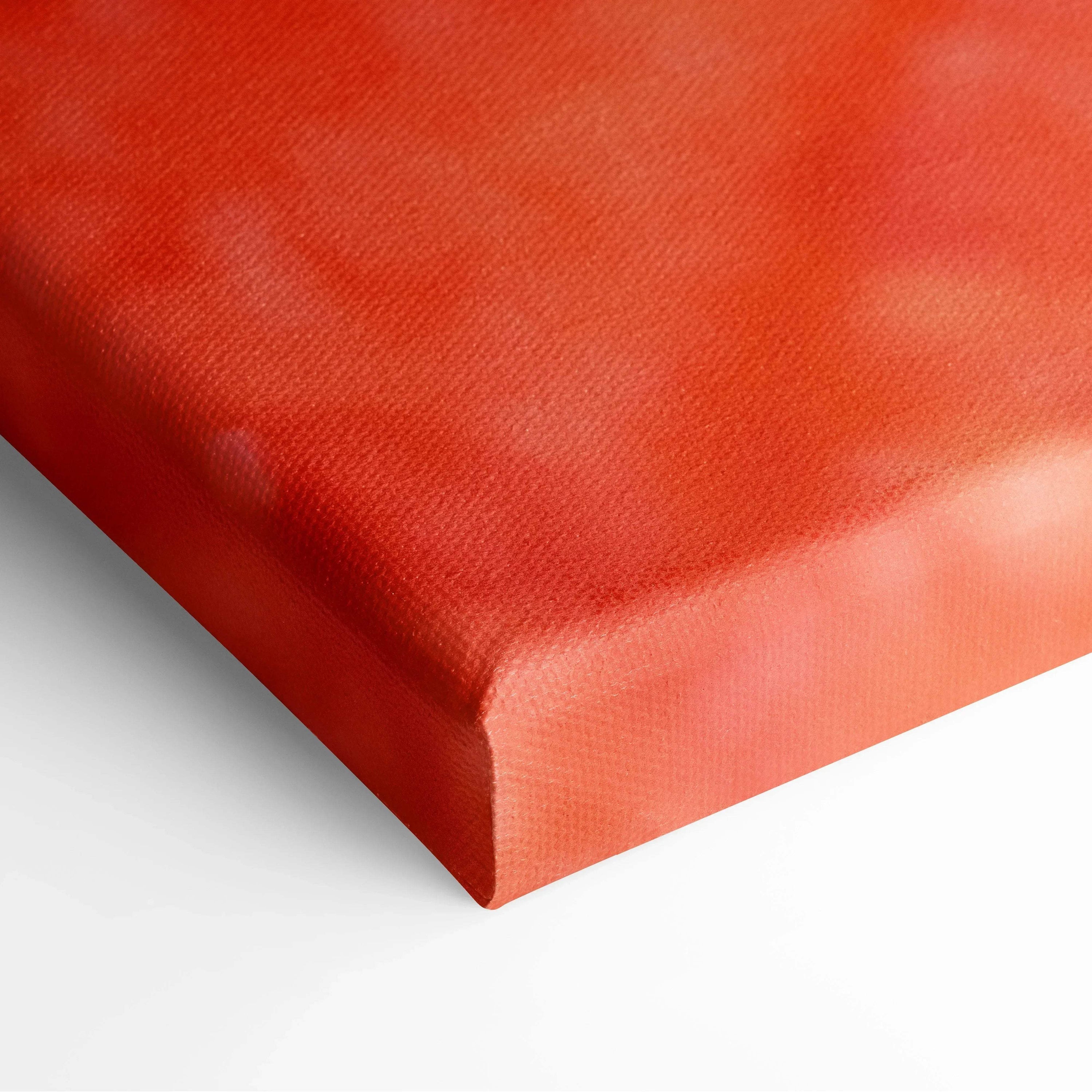 Close-up of vibrant red and pink textured canvas corner for wall art decor.