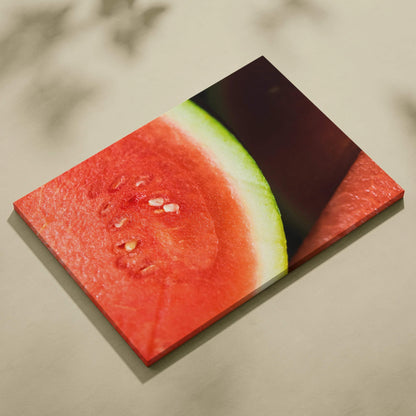 Vibrant watermelon slice close-up canvas wall art with bright red and green colors decor.