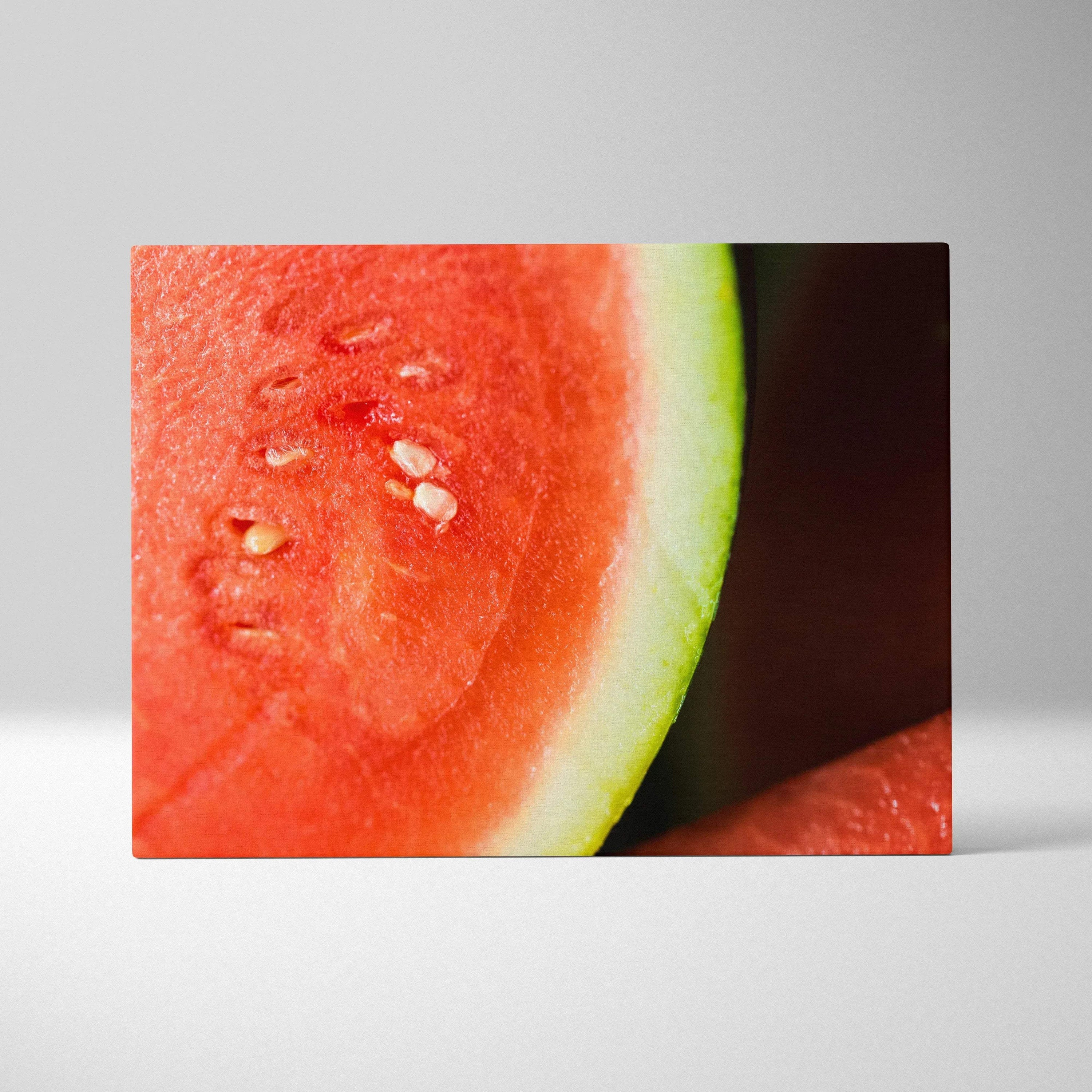 Close-up canvas wall art featuring a vibrant red and green watermelon slice with visible seeds and textured flesh.